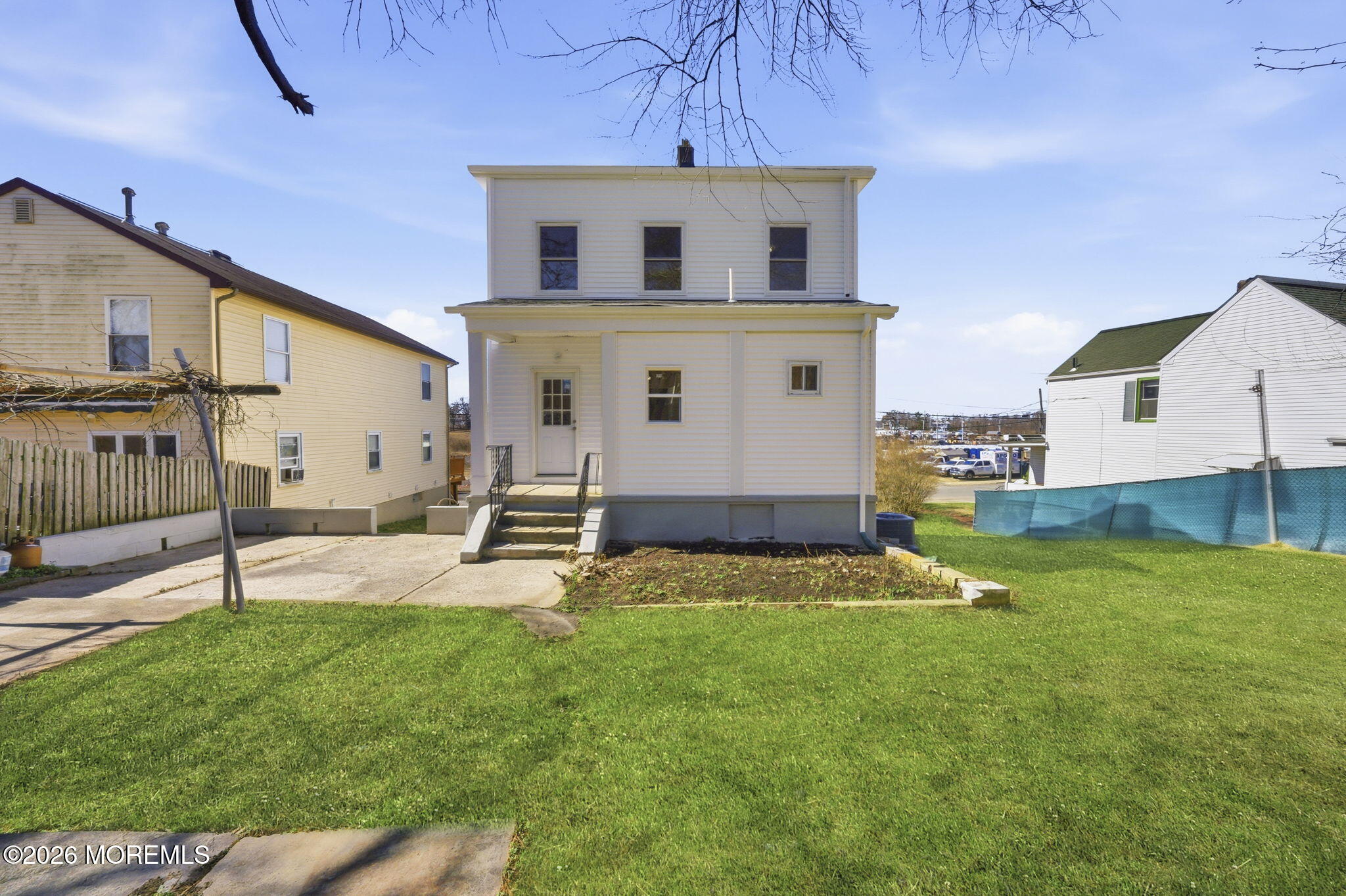 23 Beers Street Keyport, NJ 07735 - Photo 41 of 51 a house view with a sitting space and garden