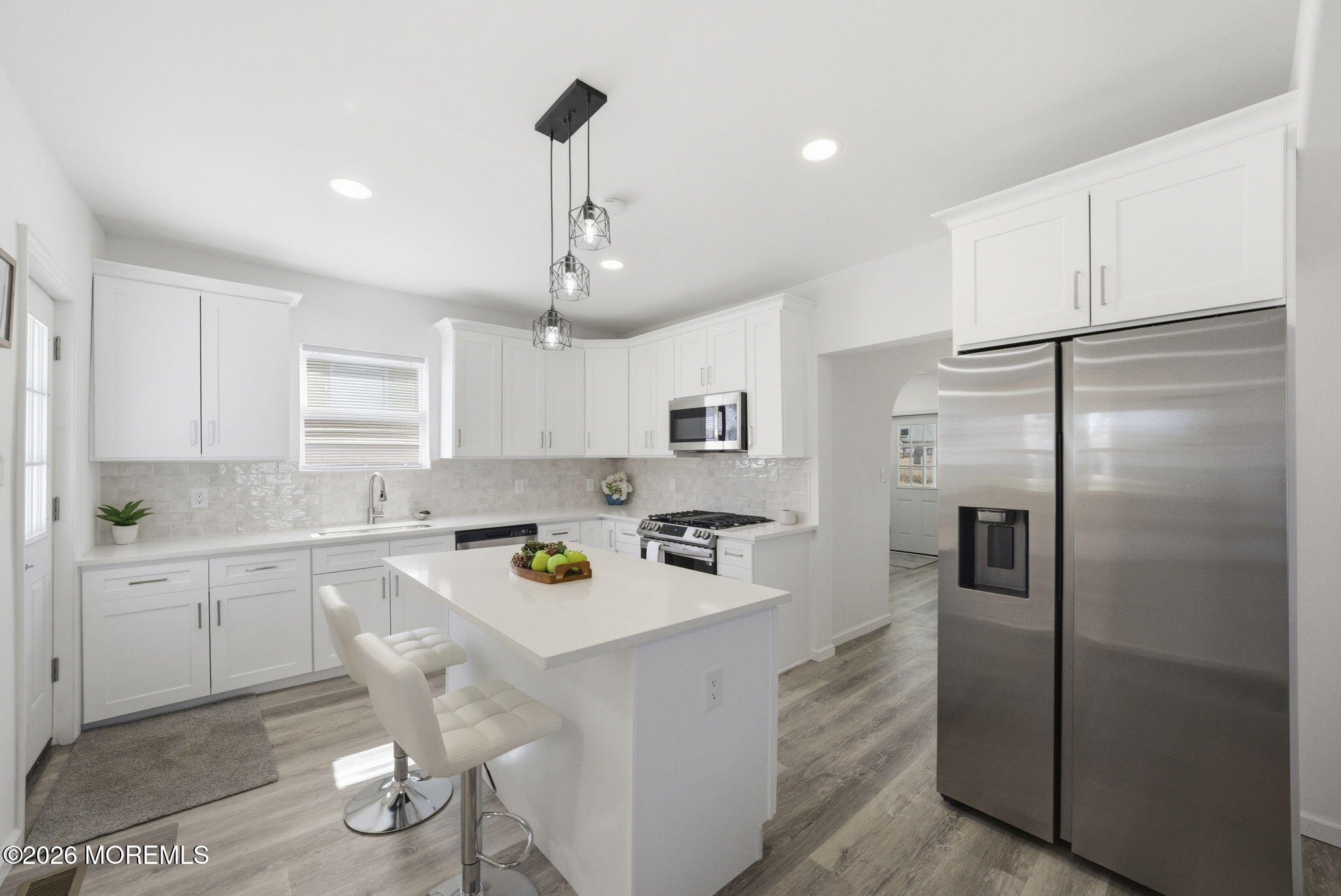23 Beers Street Keyport, NJ 07735 - Photo 7 of 51 a kitchen with refrigerator a sink and cabinets