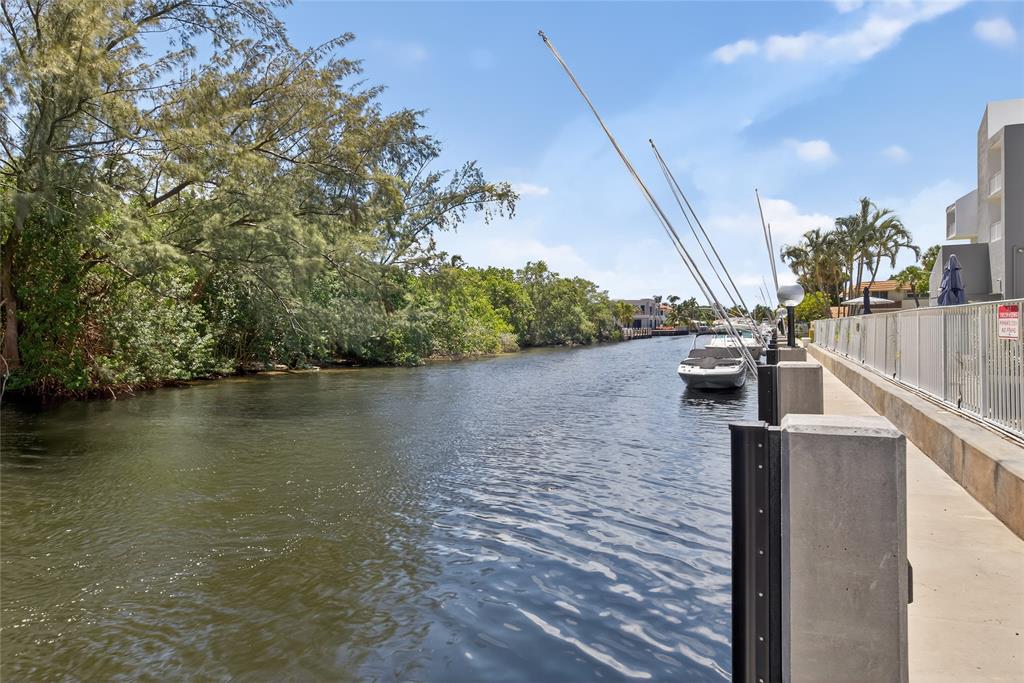 2850 Northeast 14th Street, Unit 410B Pompano Beach, FL 33062 - Photo 18 of 25 a view of a lake with a outdoor space