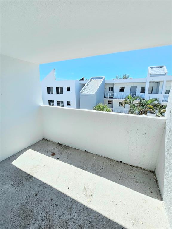 2850 Northeast 14th Street, Unit 410B Pompano Beach, FL 33062 - Photo 20 of 25 a view of a living room