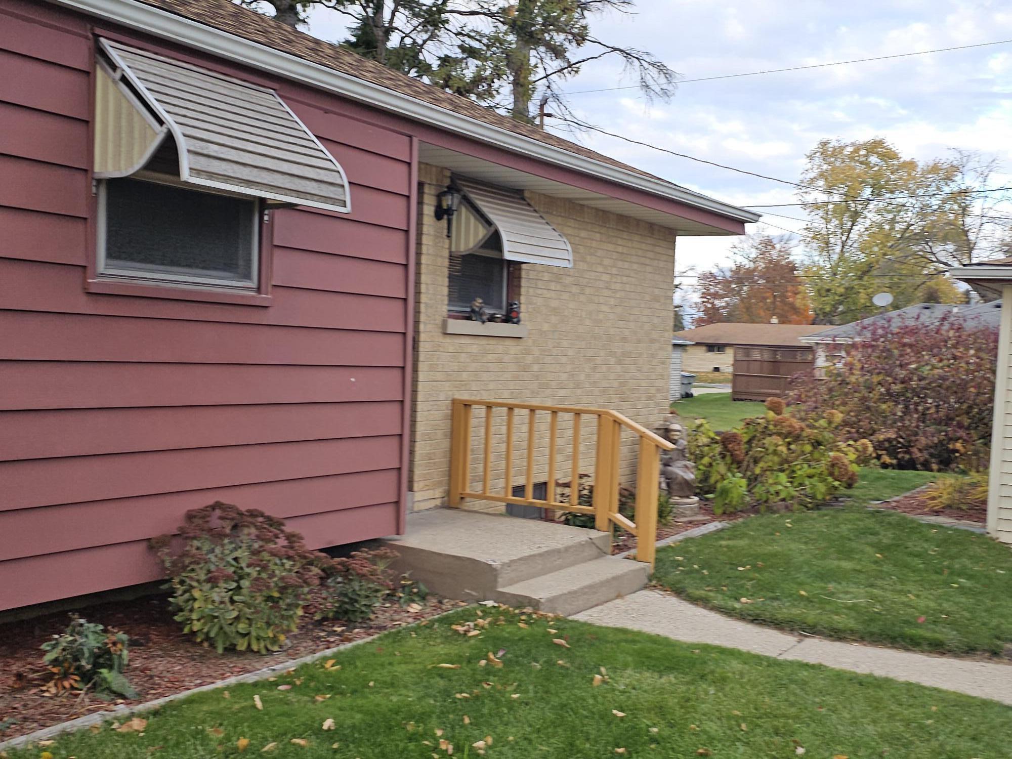 7650 North Delta Place Milwaukee, WI 53223 - Photo 26 of 32 Side Door