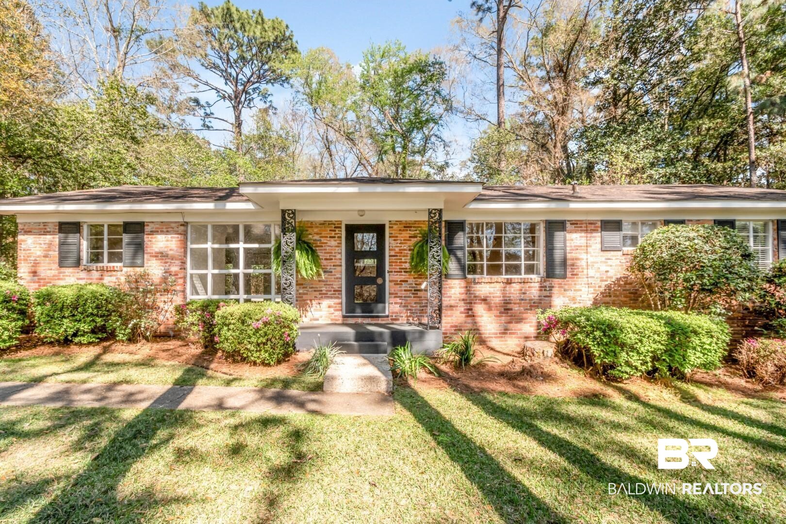 419 Ridgecrest Court Mobile, AL 36609 - Photo 1 of 20 View of front of house featuring brick siding and a front lawn