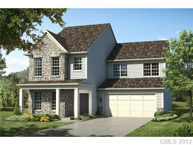 1444 Ridgehaven Road, Unit 146 Waxhaw, NC 28173 - Photo 1 of 16 a front view of a house with garden