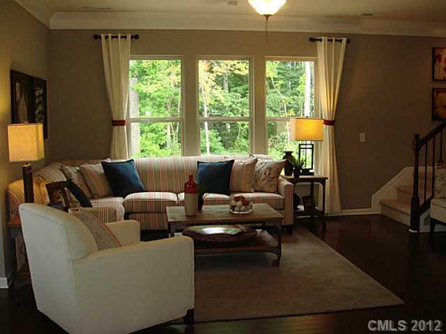 1444 Ridgehaven Road, Unit 146 Waxhaw, NC 28173 - Photo 6 of 16 a living room with furniture and a large window