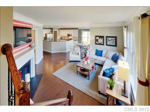 1444 Ridgehaven Road, Unit 146 Waxhaw, NC 28173 - Photo 7 of 16 a living room with furniture and a flat screen tv
