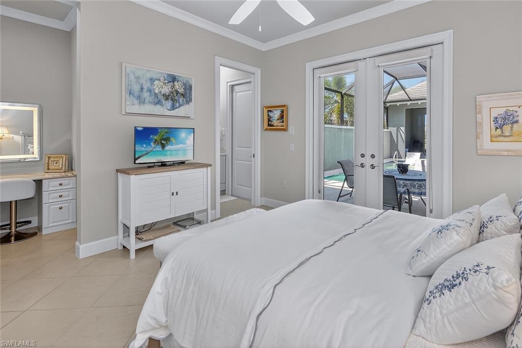 6387 Warwick Avenue Naples, FL 34113 - Photo 20 of 40 Casita bedroom, featuring private entrance, full bathroom, walk in closet and access to the courtyard heated pool