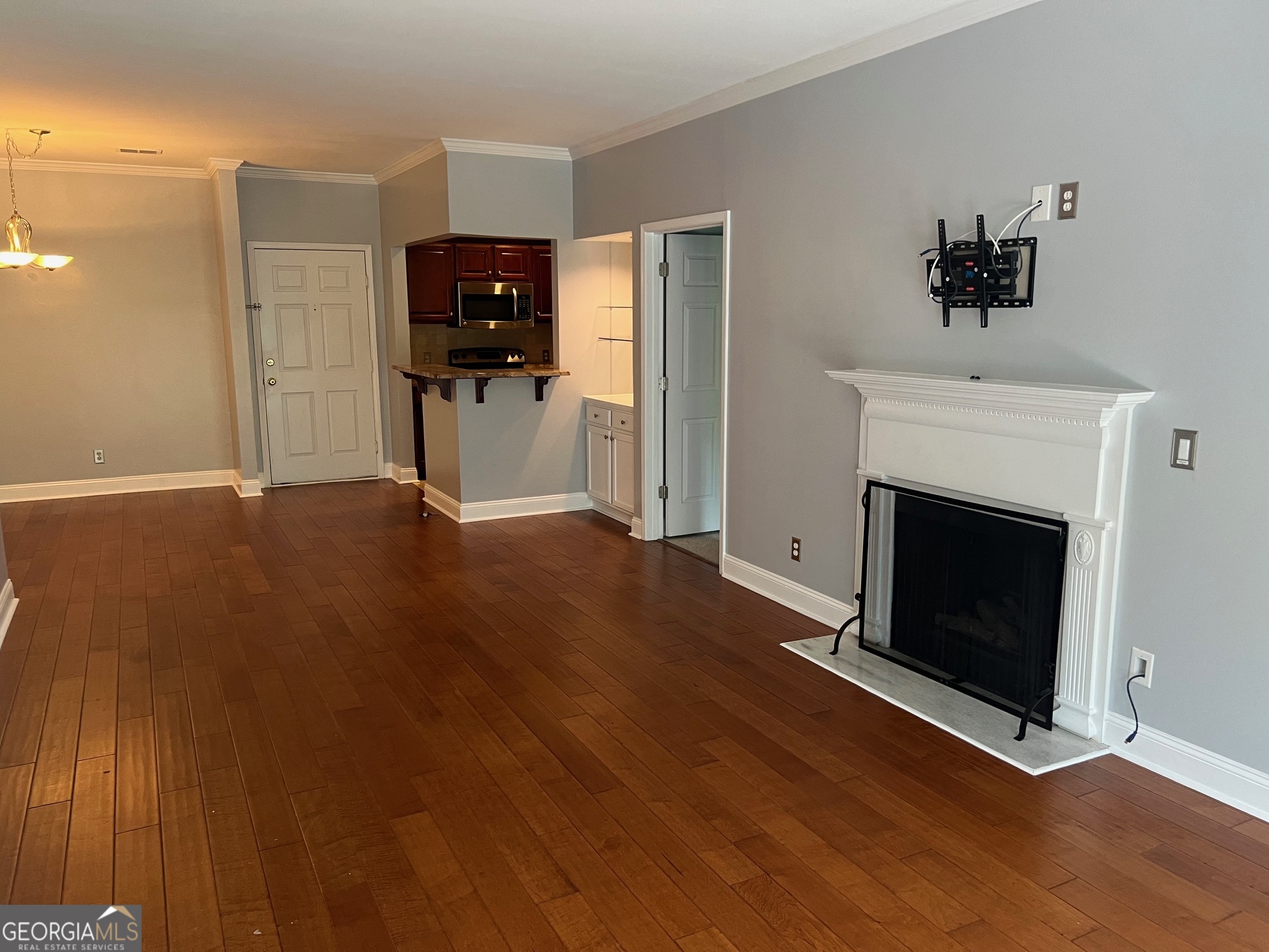 3071 Lenox Road Northeast, Unit 39 Atlanta, GA 30324 - Photo 15 of 29 a view of a livingroom with a fireplace and tv