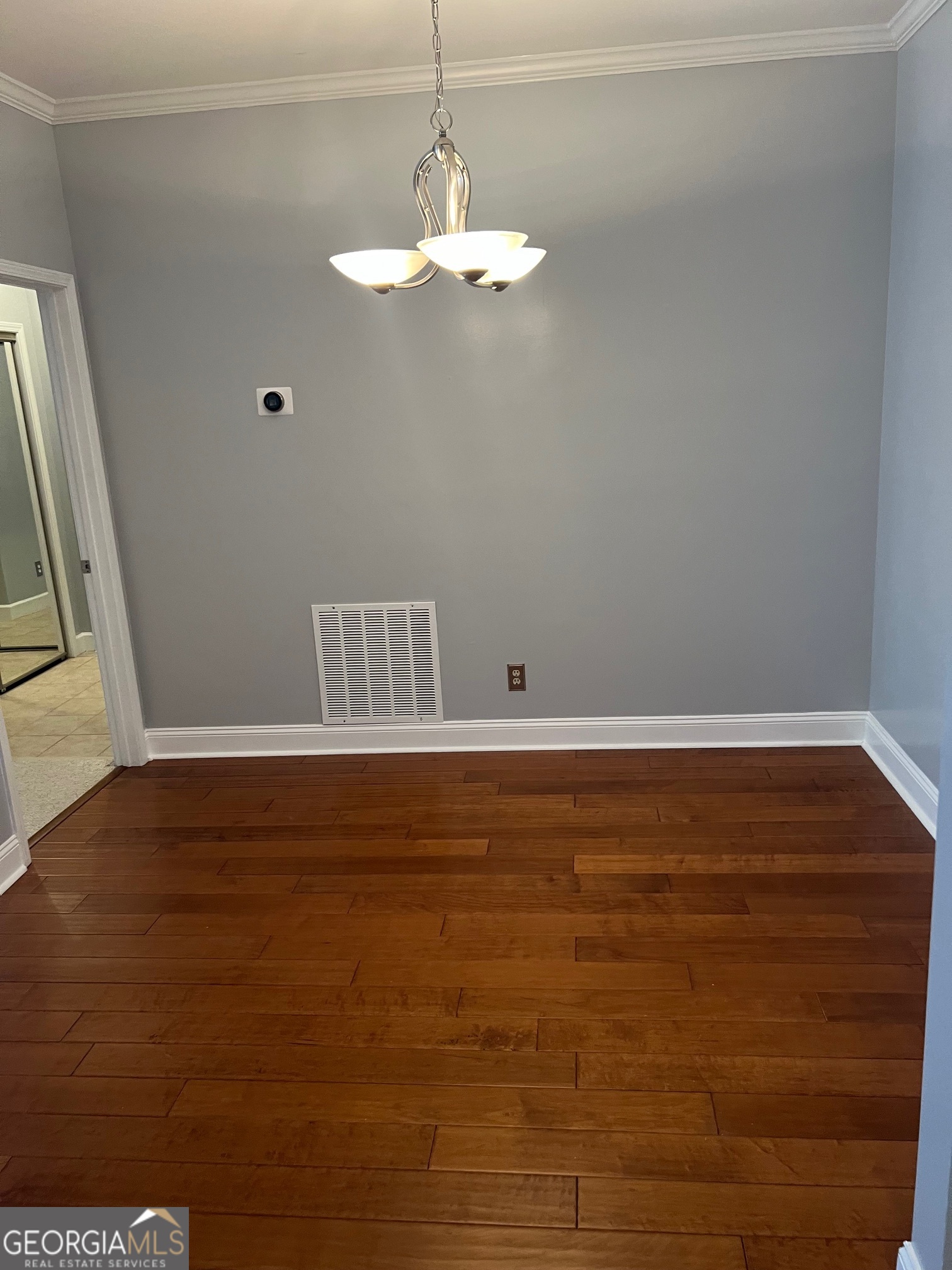 3071 Lenox Road Northeast, Unit 39 Atlanta, GA 30324 - Photo 18 of 29 a view of room with window and wooden floor