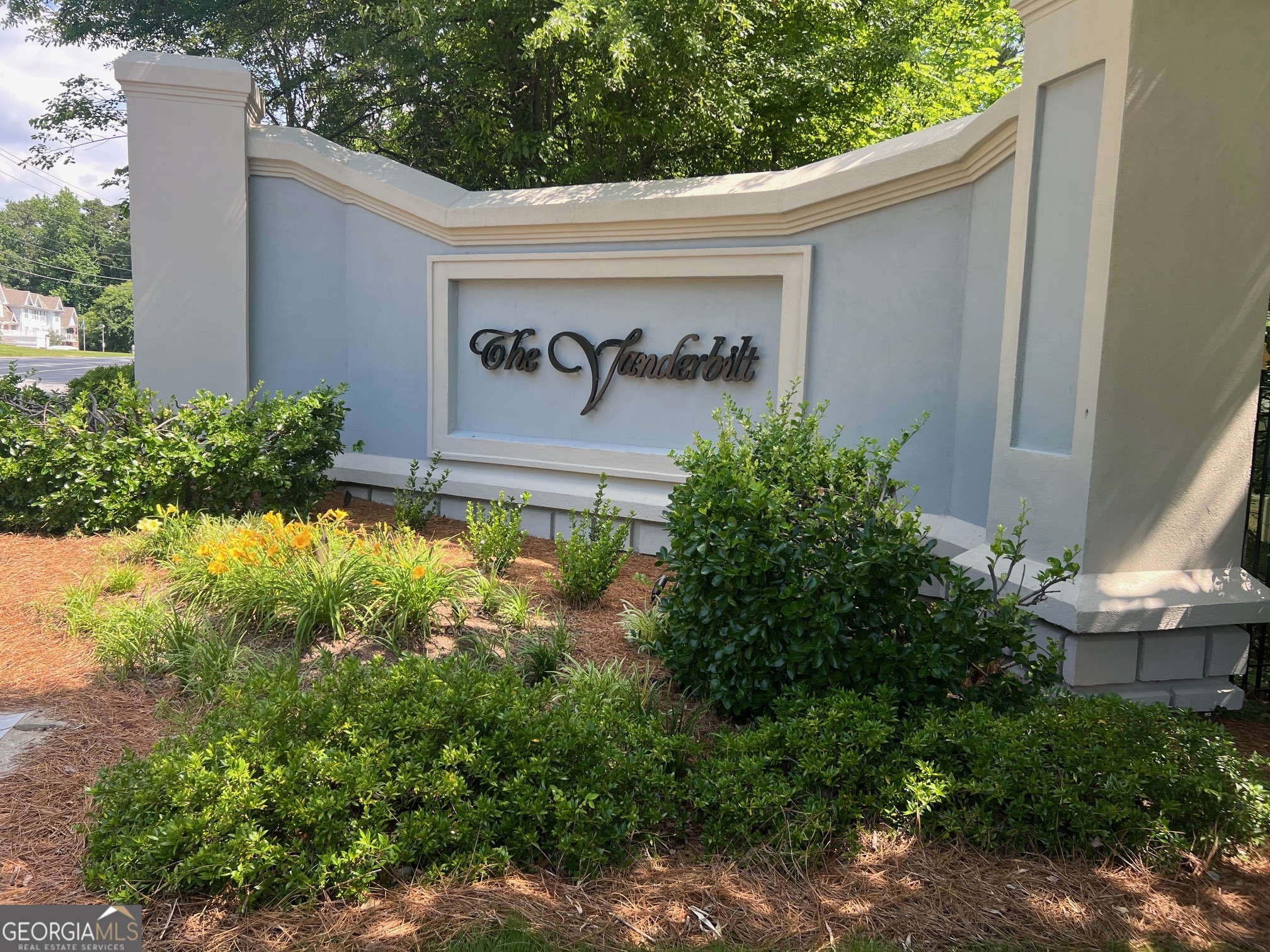 3071 Lenox Road Northeast, Unit 39 Atlanta, GA 30324 - Photo 2 of 29 a view of outdoor space with garden and plants