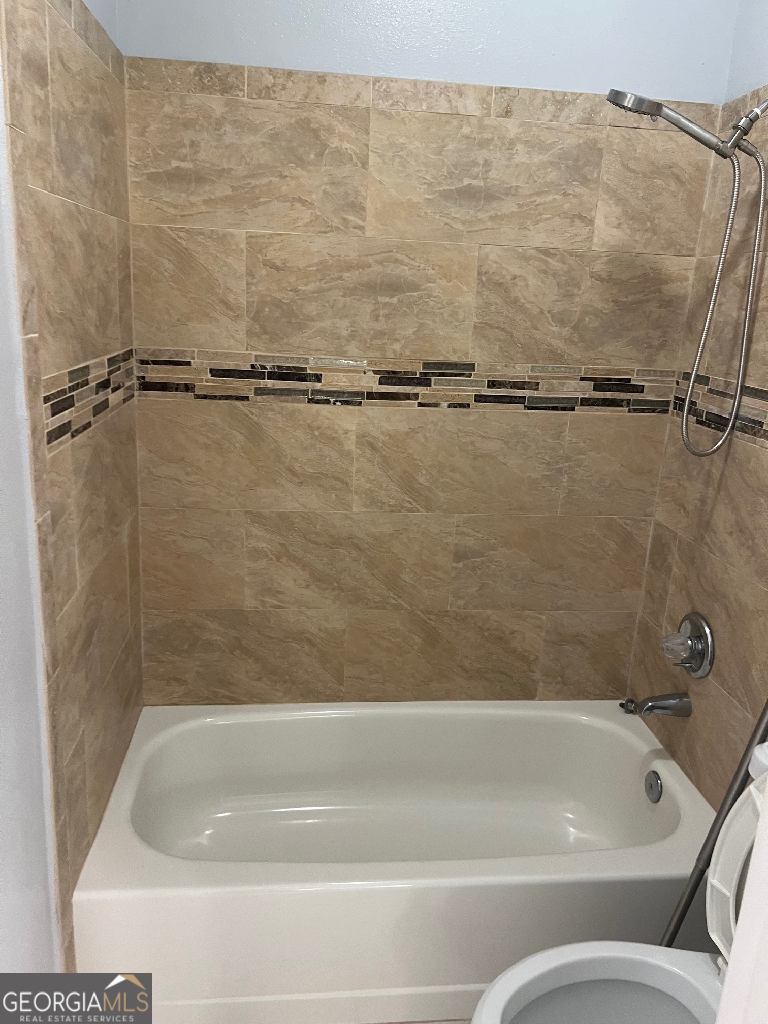 3071 Lenox Road Northeast, Unit 39 Atlanta, GA 30324 - Photo 29 of 29 a close view of a bathtub in bathroom