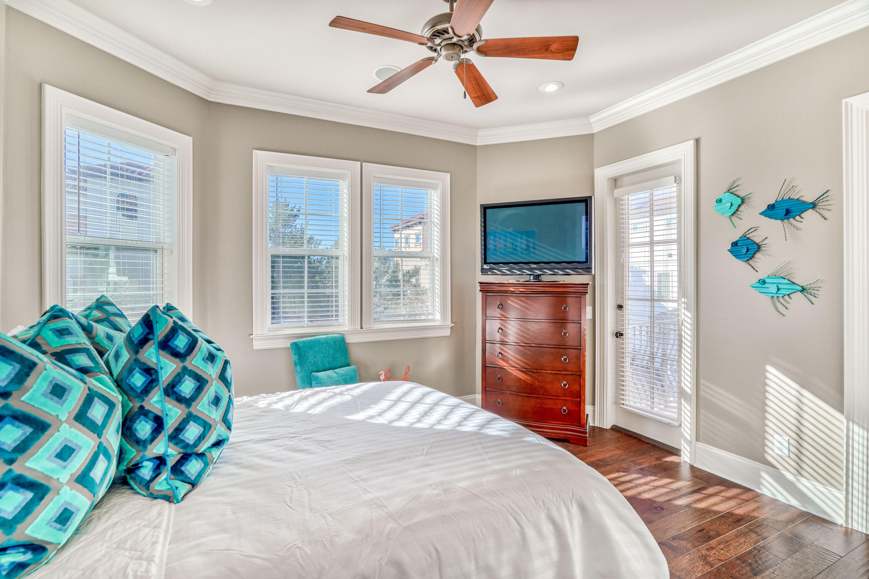 89 Palmeira Way Santa Rosa Beach, FL 32459 - Photo 29 of 64 a bedroom with a bed and a flat screen tv