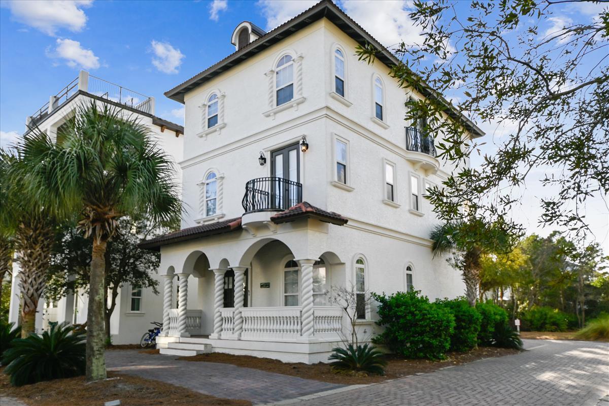 89 Palmeira Way Santa Rosa Beach, FL 32459 - Photo 3 of 64 a front view of a house with a yard
