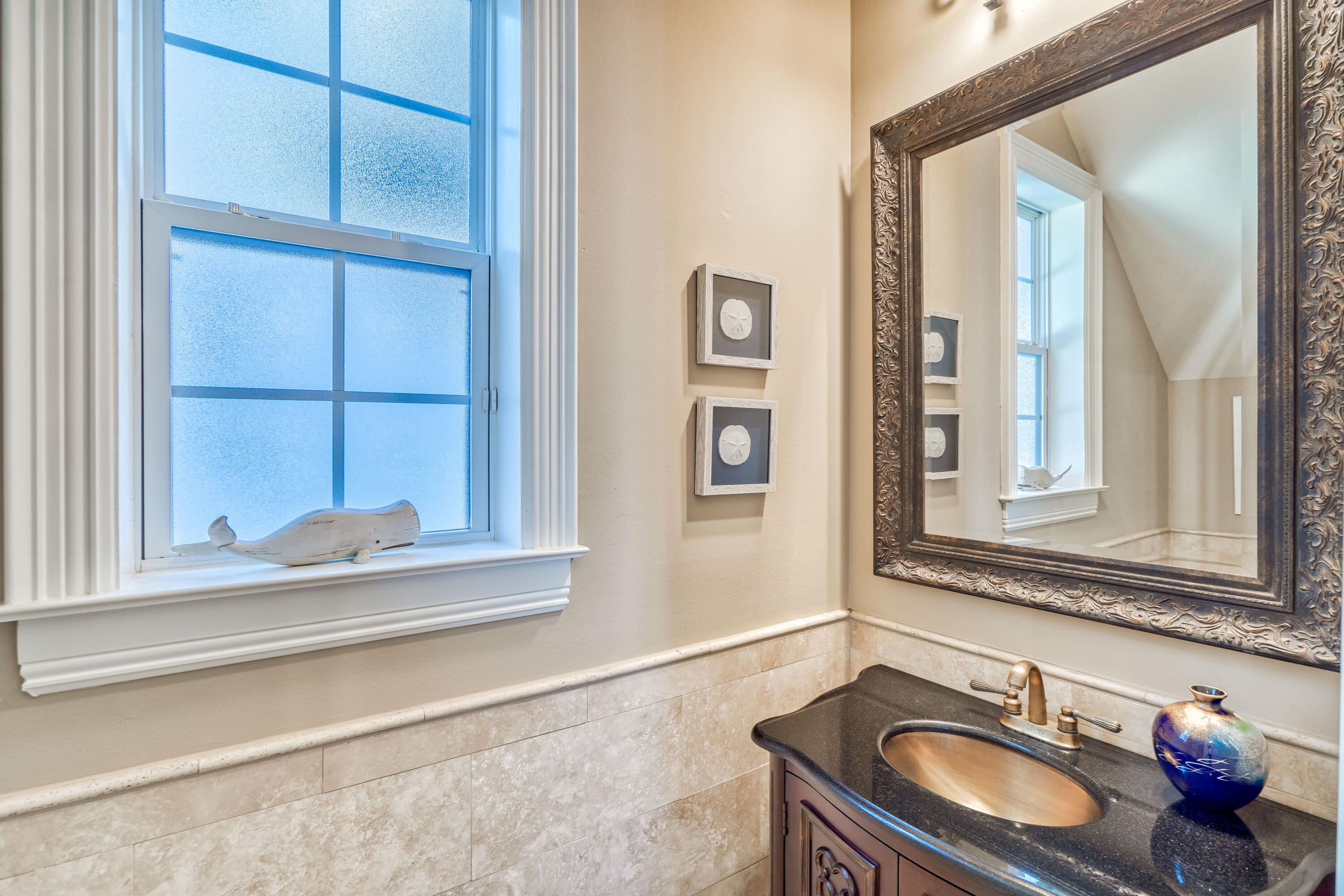 89 Palmeira Way Santa Rosa Beach, FL 32459 - Photo 34 of 64 a bathroom with a sink and a mirror