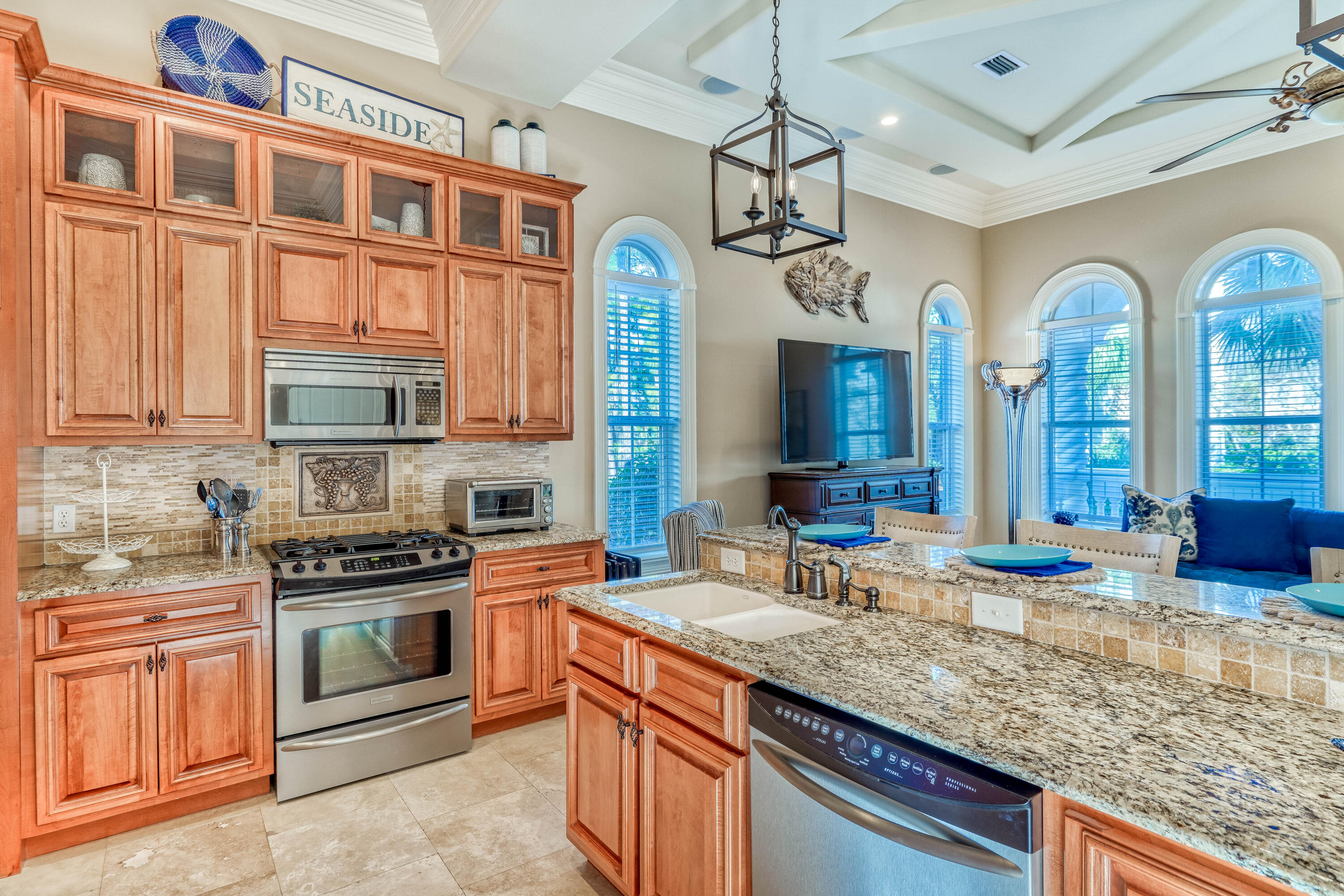 89 Palmeira Way Santa Rosa Beach, FL 32459 - Photo 8 of 64 a kitchen with stainless steel appliances granite countertop a stove and a sink