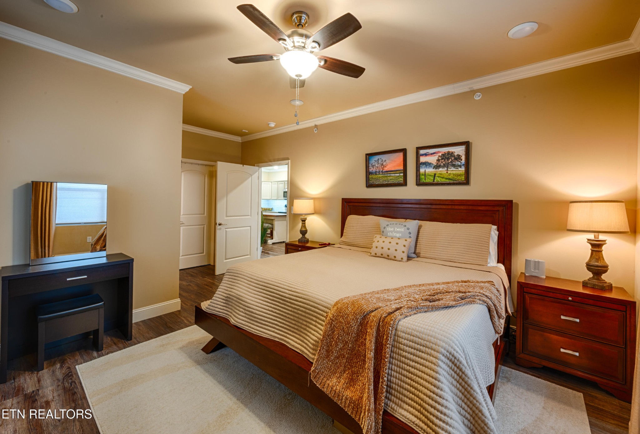 229 Bishops Cap Circle, Unit 101 Townsend, TN 37882 - Photo 22 of 47 a bedroom with a bed and a chandelier