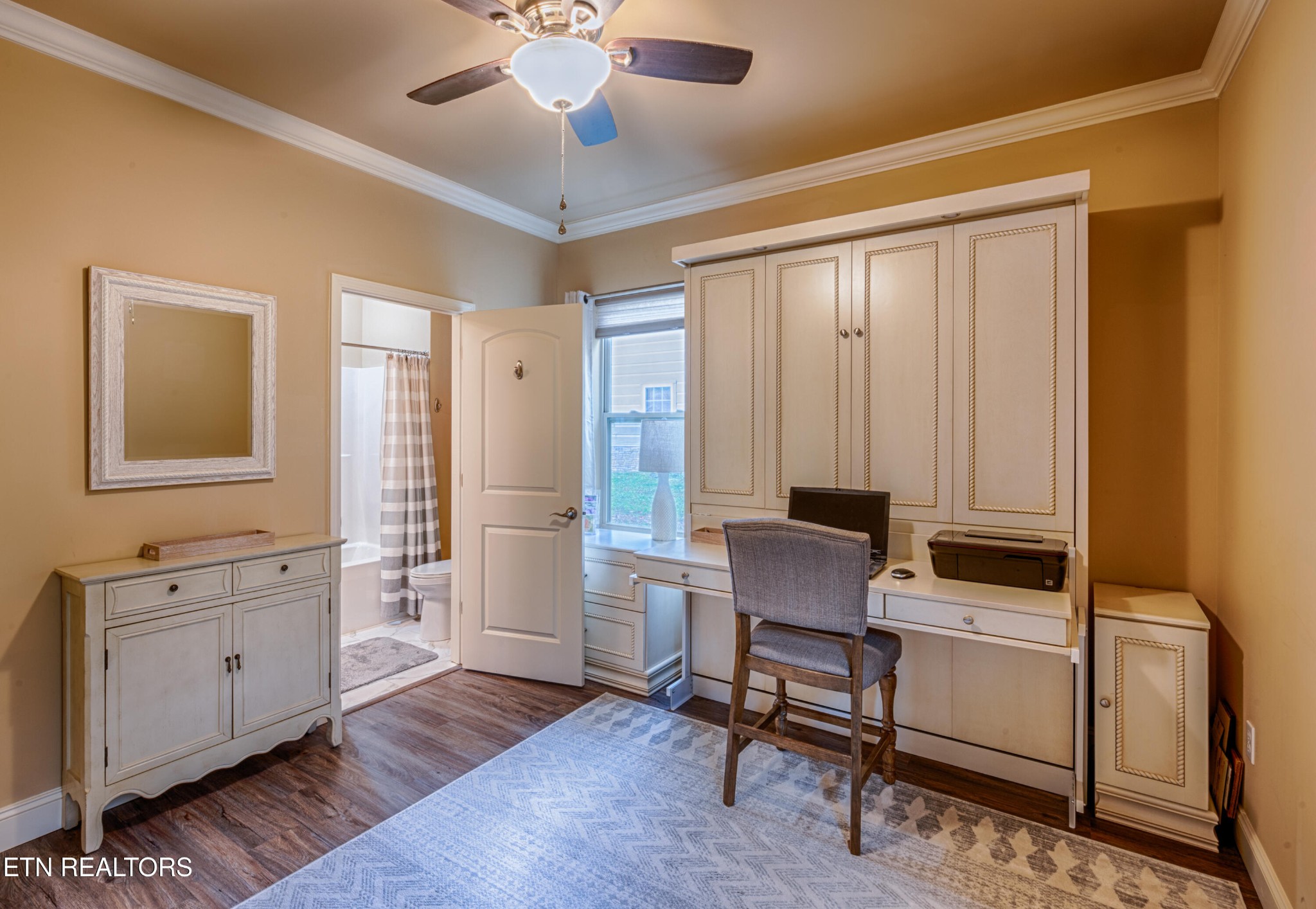 229 Bishops Cap Circle, Unit 101 Townsend, TN 37882 - Photo 30 of 47 a workspace with wooden floor and furniture