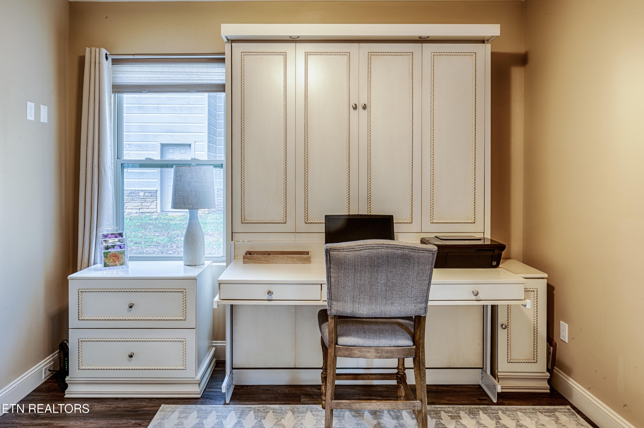 229 Bishops Cap Circle, Unit 101 Townsend, TN 37882 - Photo 31 of 47 a dining room with furniture and window