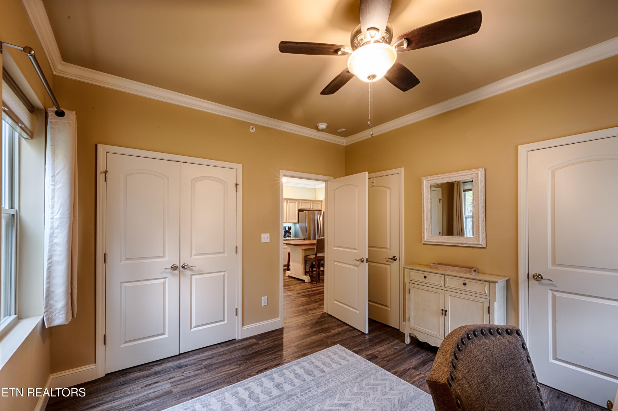 229 Bishops Cap Circle, Unit 101 Townsend, TN 37882 - Photo 33 of 47 a livingroom with furniture and wooden floor