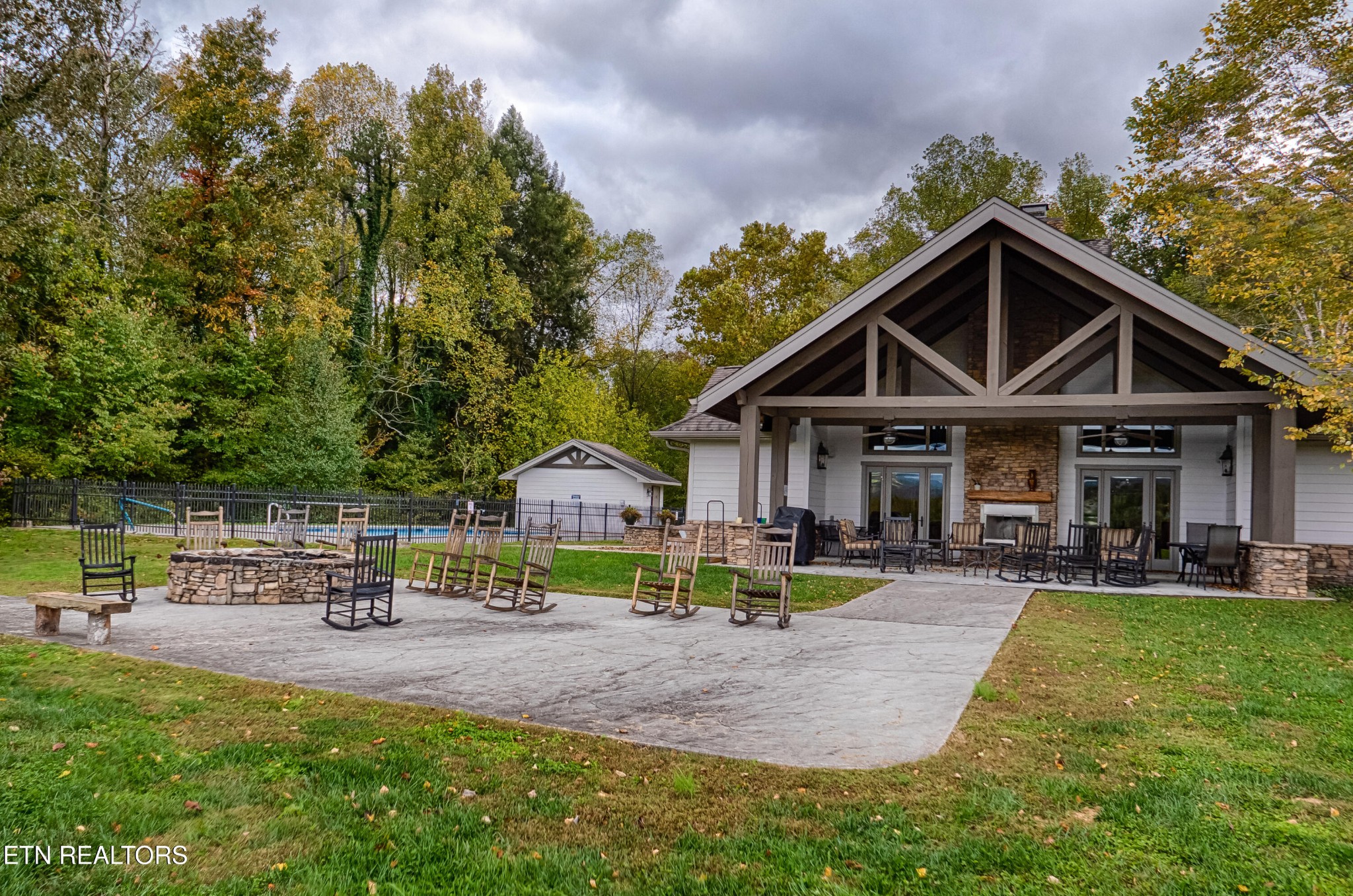 229 Bishops Cap Circle, Unit 101 Townsend, TN 37882 - Photo 43 of 47 a view of a house with a yard patio and sitting area