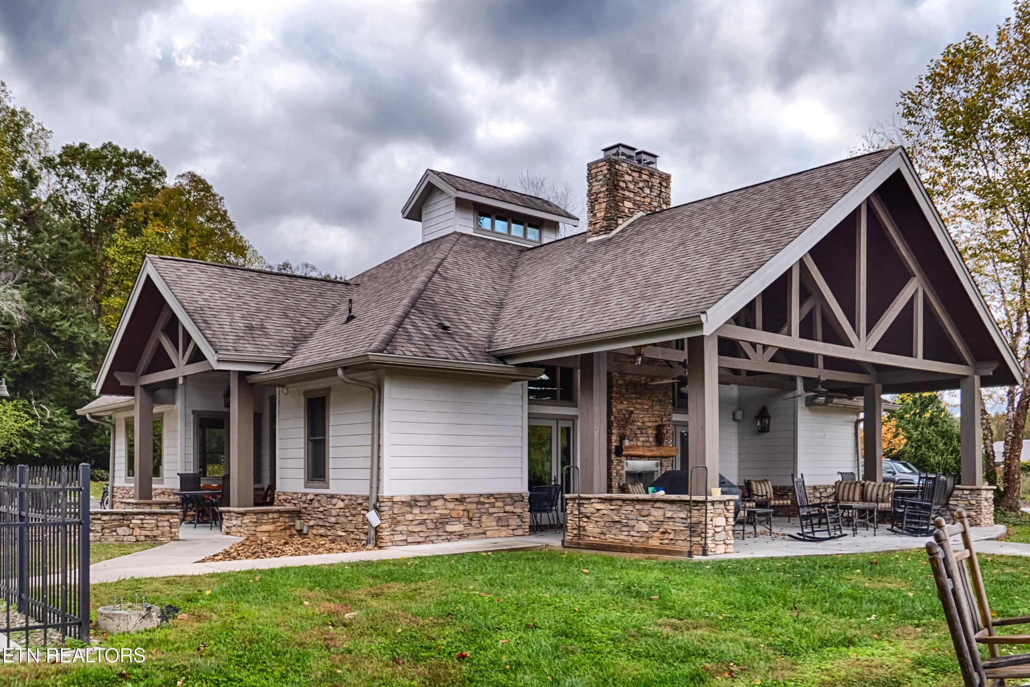 229 Bishops Cap Circle, Unit 101 Townsend, TN 37882 - Photo 44 of 47 a front view of a house with garden