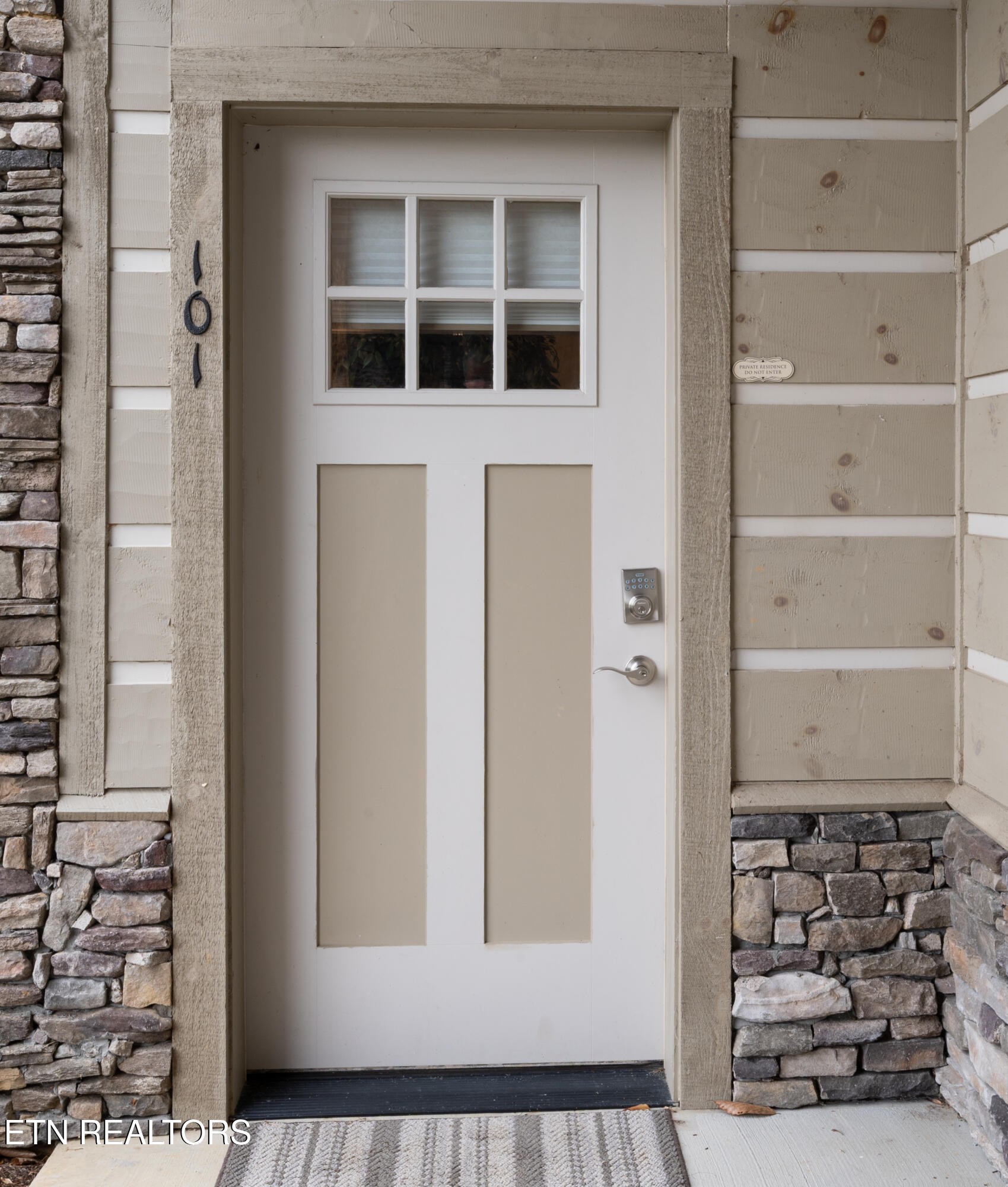 229 Bishops Cap Circle, Unit 101 Townsend, TN 37882 - Photo 5 of 47 a view of a door and a window