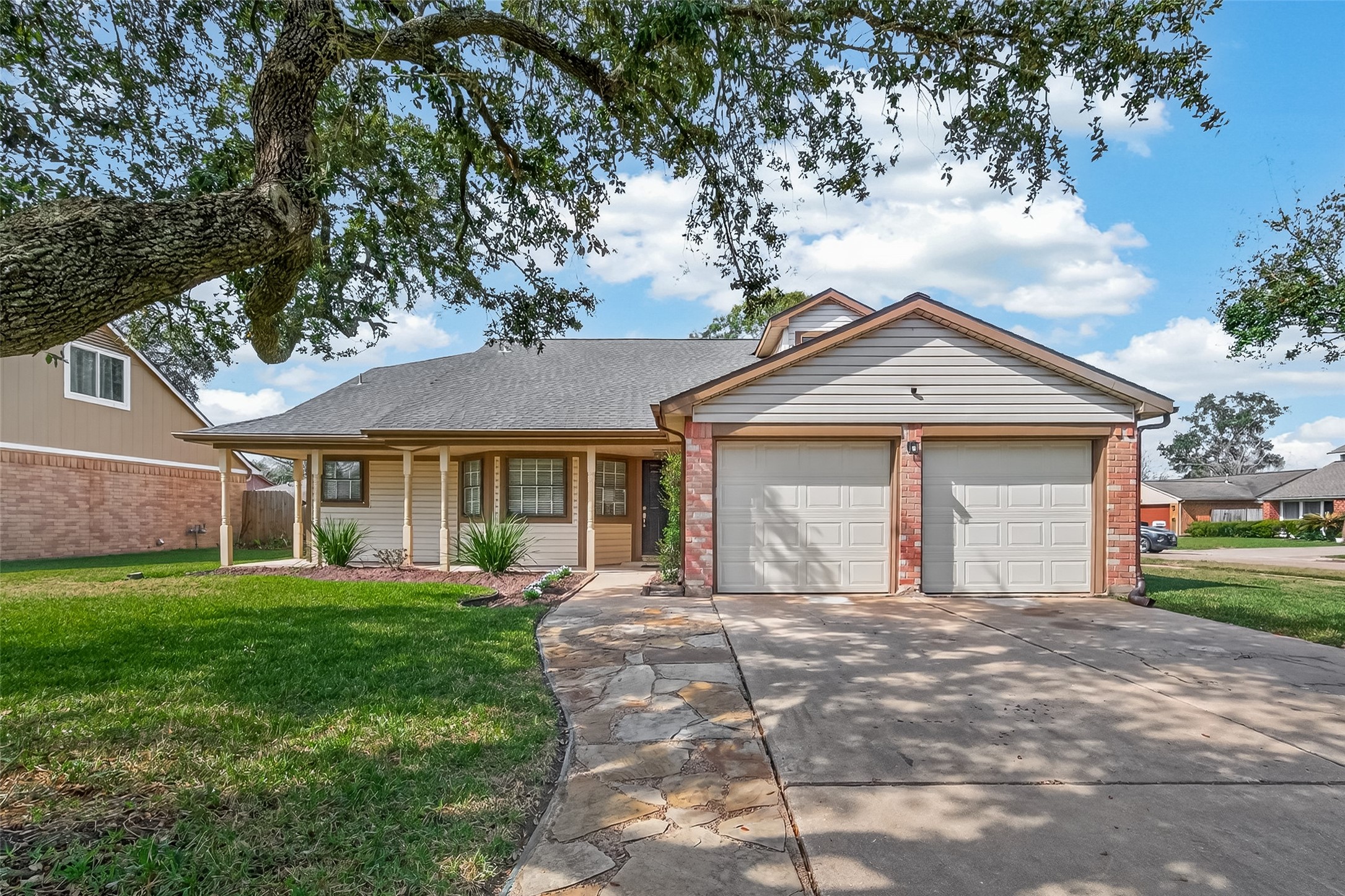 555 Shealy Street Houston, TX 77598 - Photo 1 of 41 front view of a house with a yard