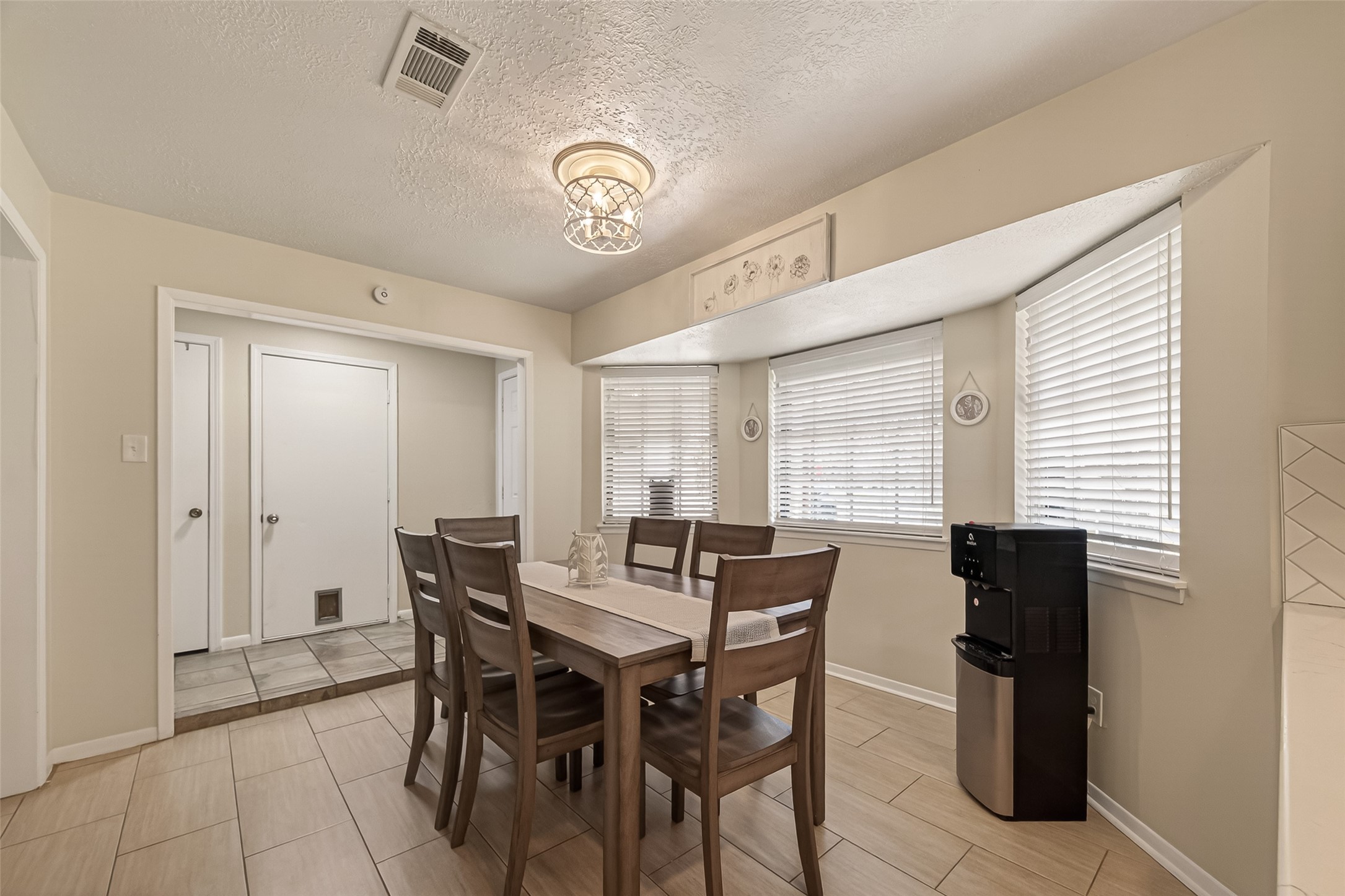 555 Shealy Street Houston, TX 77598 - Photo 12 of 41 a view of a dining room with furniture
