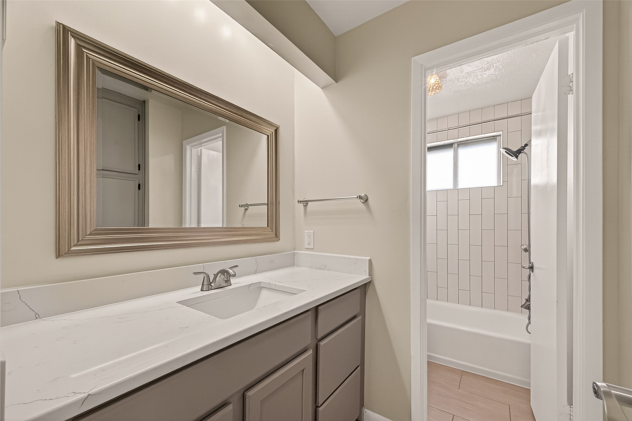 555 Shealy Street Houston, TX 77598 - Photo 18 of 41 a bathroom with a sink and a mirror