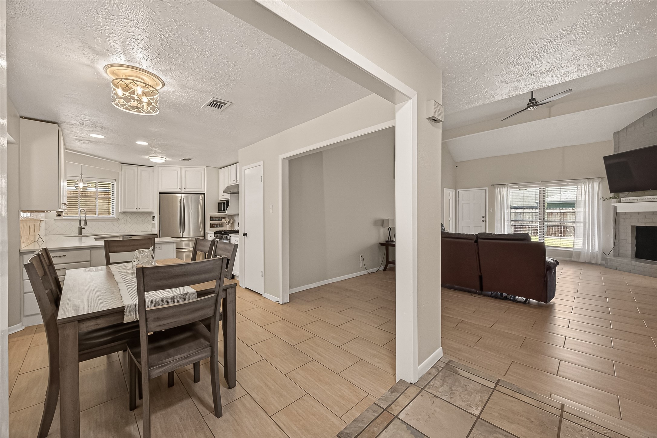 555 Shealy Street Houston, TX 77598 - Photo 10 of 41 a view of a dining room with furniture