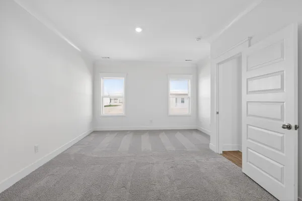 a bathroom with a double vanity sink and mirror