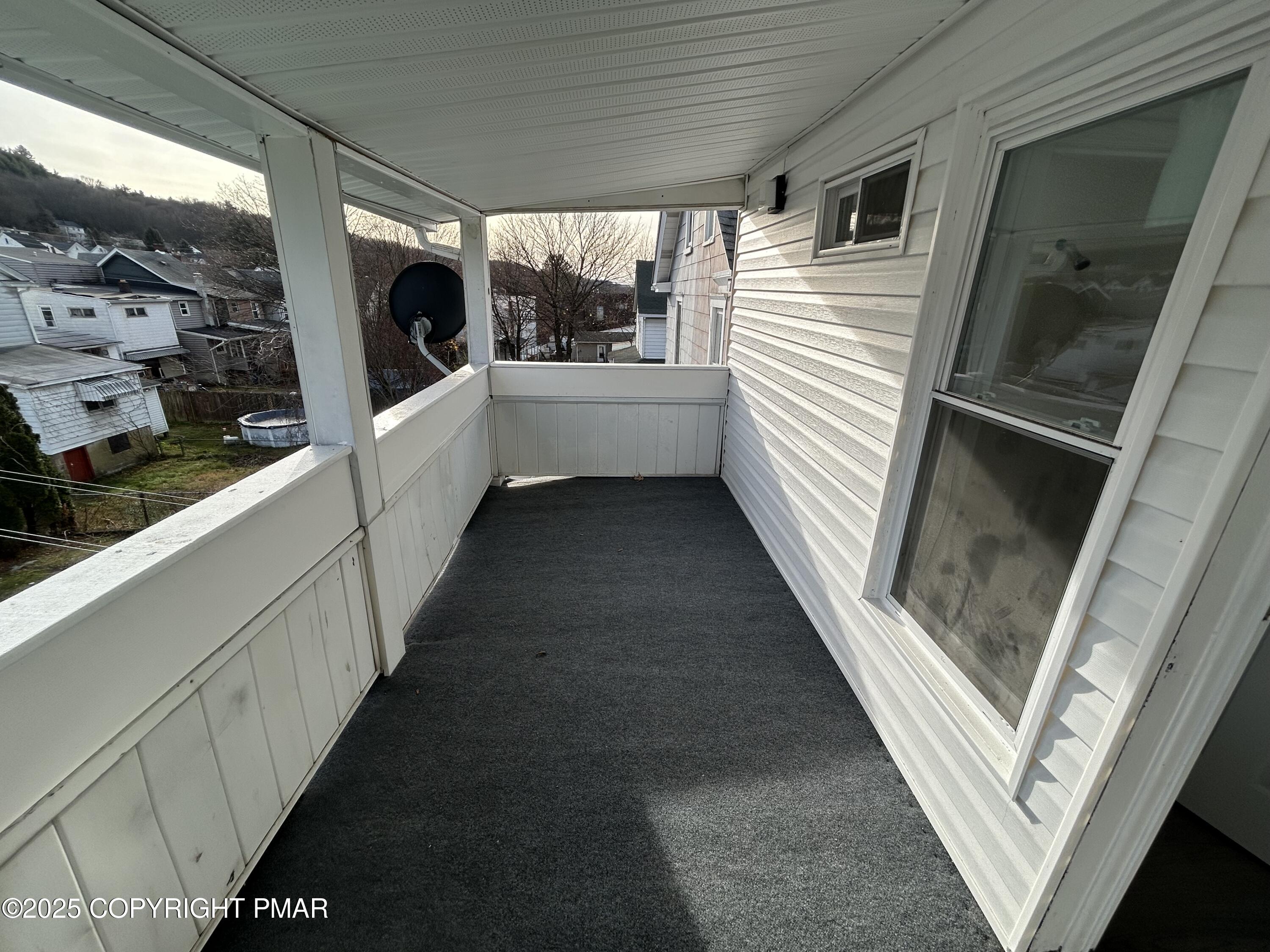 222 East Patterson Street, Unit 4 Lansford, PA 18232 - Photo 15 of 16 a view of a balcony with furniture and a window
