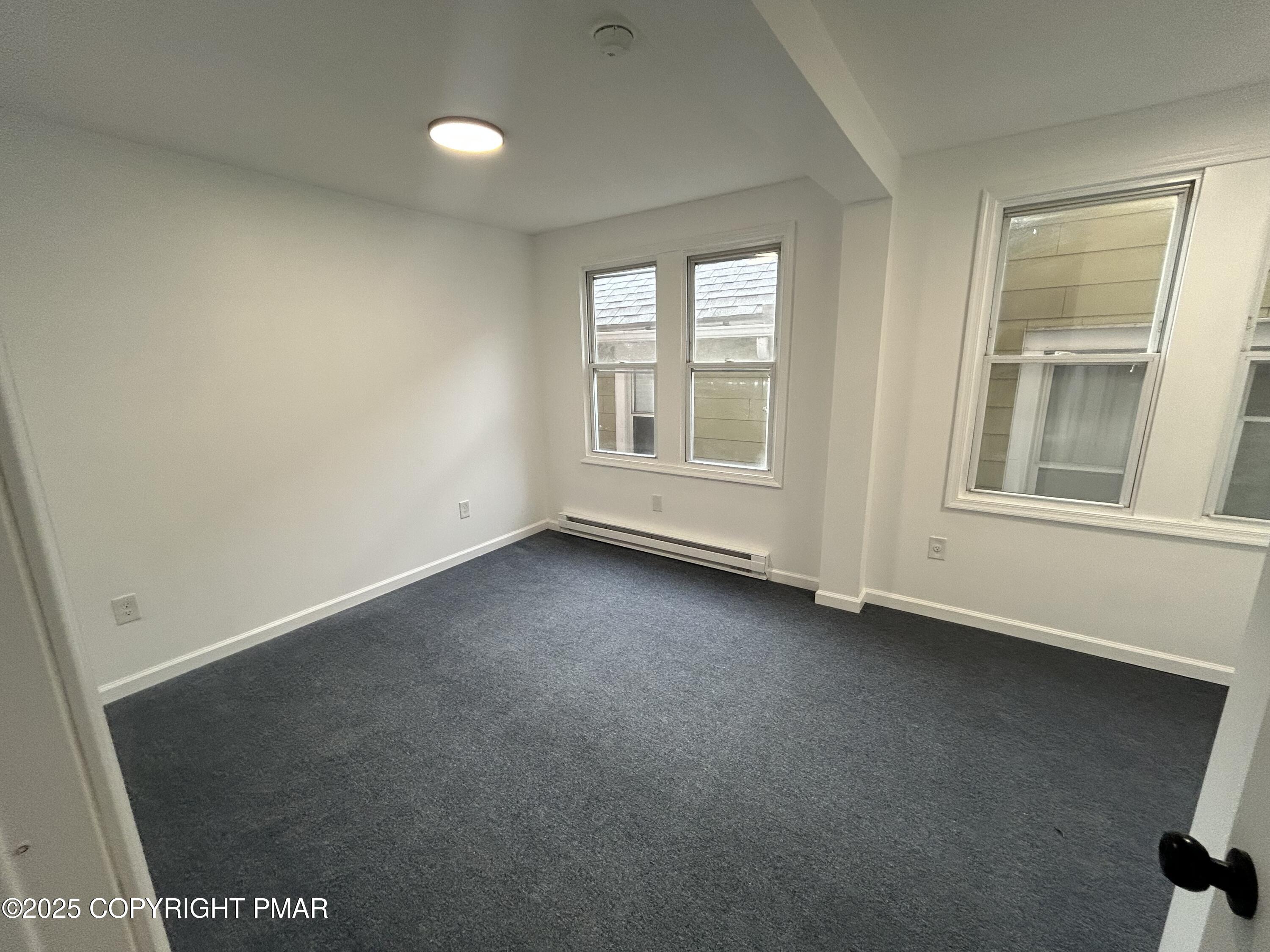 222 East Patterson Street, Unit 4 Lansford, PA 18232 - Photo 5 of 16 an empty room with a window