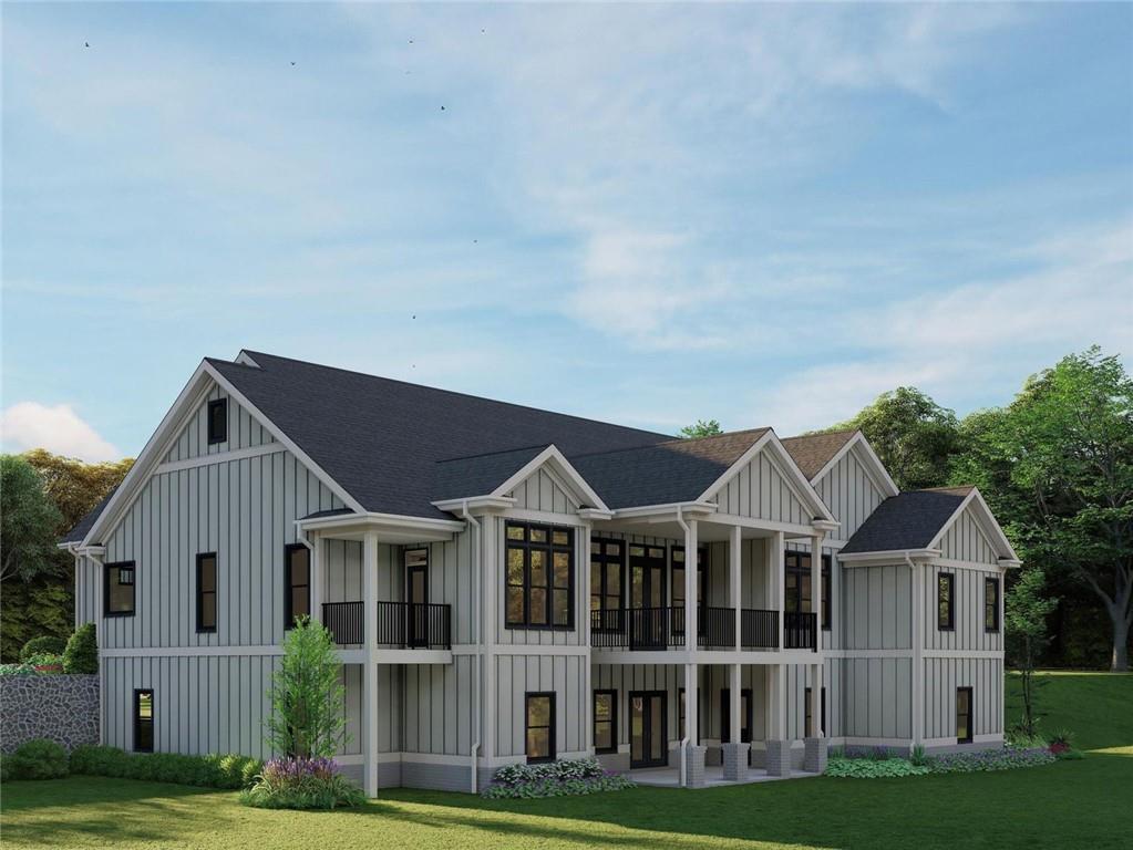 2468 Rockbridge Road Northwest Conyers, GA 30012 - Photo 4 of 8 a front view of a house with a garden