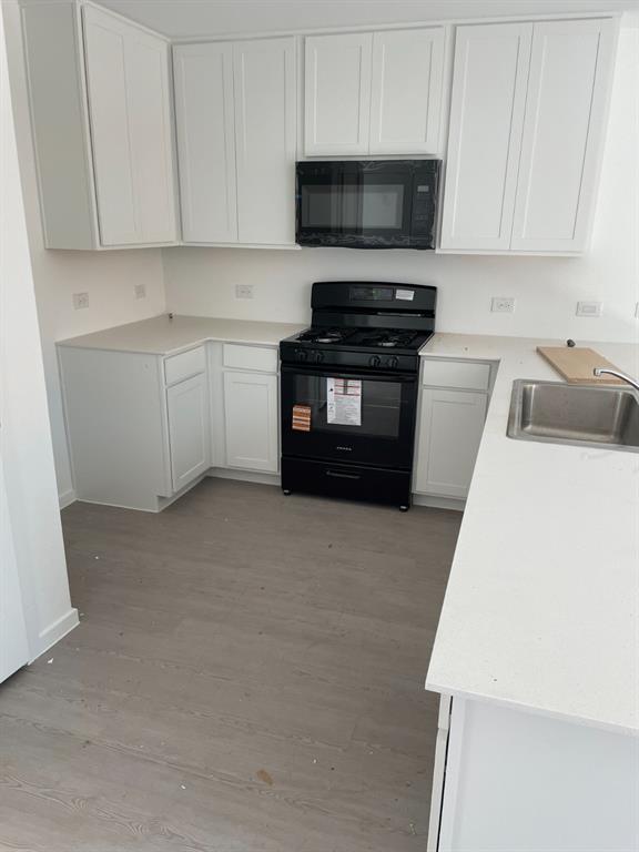 1021 Raintree Road Princeton, TX 75407 - Photo 4 of 16 Kitchen and Cabinet