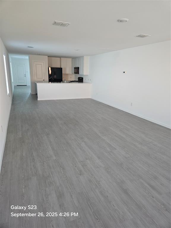 1021 Raintree Road Princeton, TX 75407 - Photo 5 of 16 Kitchen with living room picture
