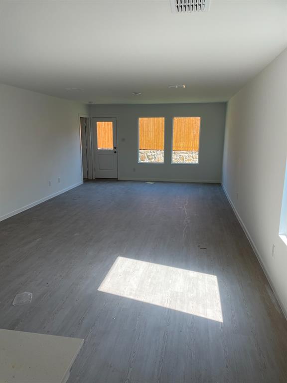 1021 Raintree Road Princeton, TX 75407 - Photo 6 of 16 Living Room with open floor concept