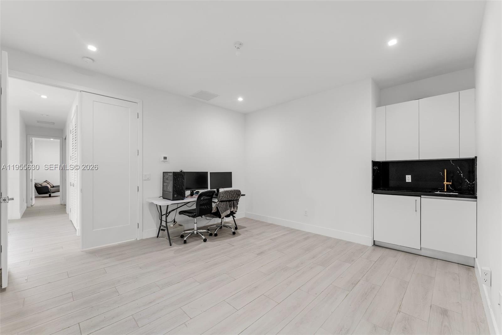 4950 Southwest 158th Ave Ranches Southwest Ranches, FL 33331 - Photo 32 of 75 a living room with furniture and a flat screen tv