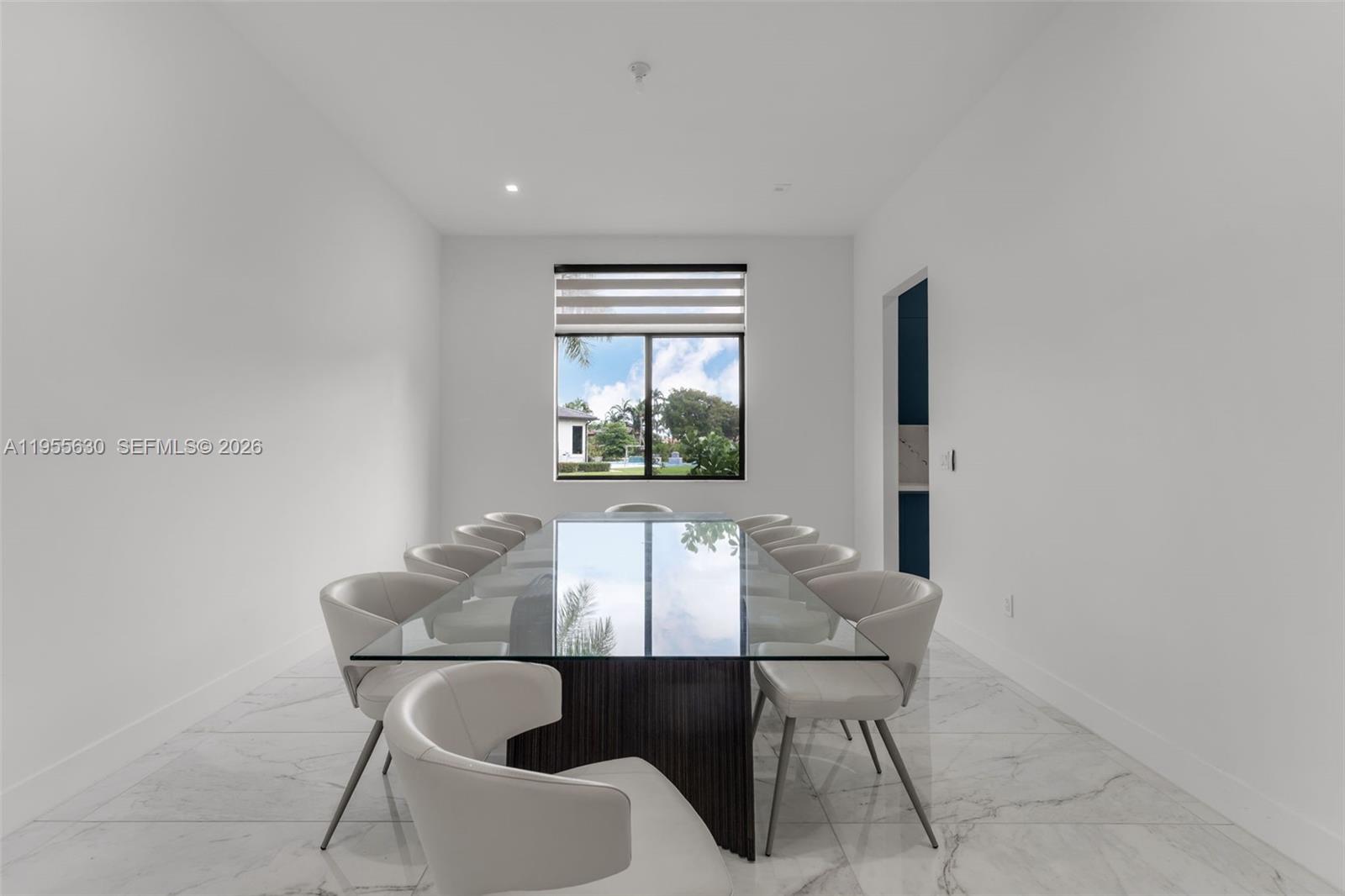 4950 Southwest 158th Ave Ranches Southwest Ranches, FL 33331 - Photo 8 of 75 a dining room with furniture and window