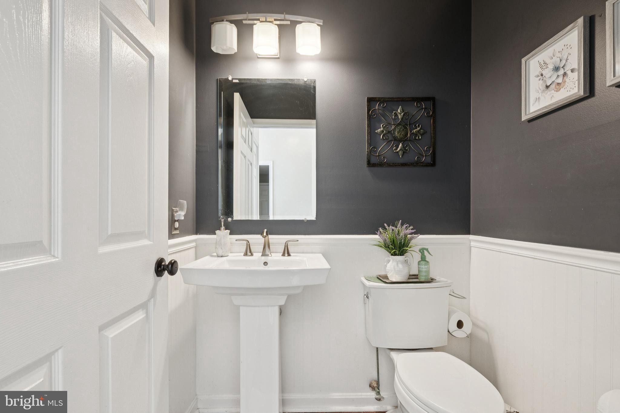 7 Meadowbrook Drive Westampton, NJ 08060 - Photo 15 of 25 a bathroom with a toilet sink and mirror