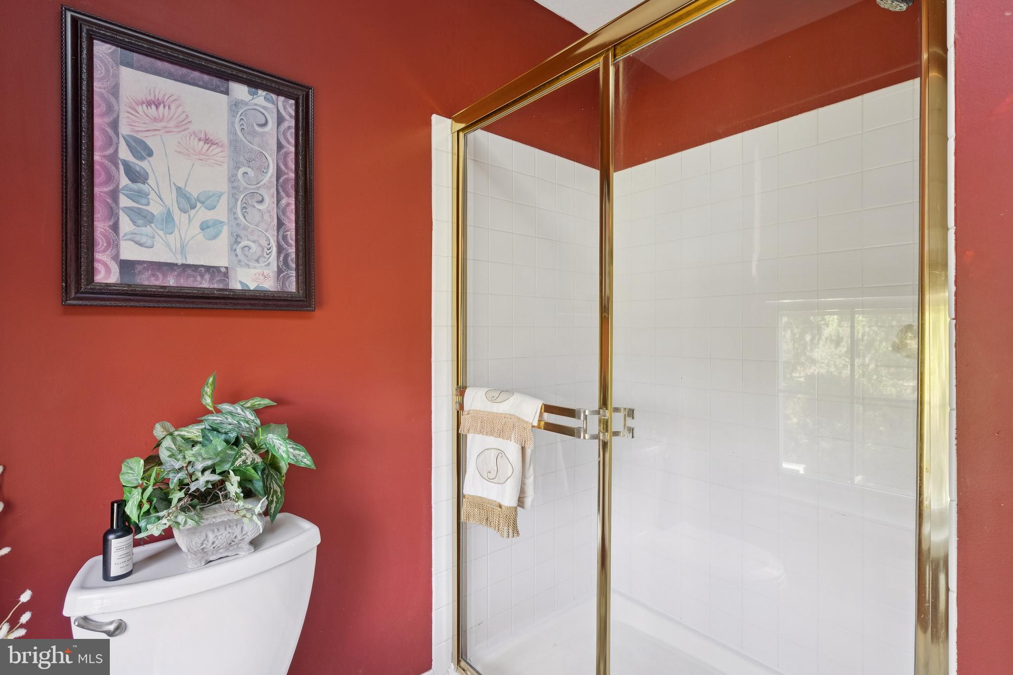 7 Meadowbrook Drive Westampton, NJ 08060 - Photo 19 of 25 a bathroom with a shower curtain