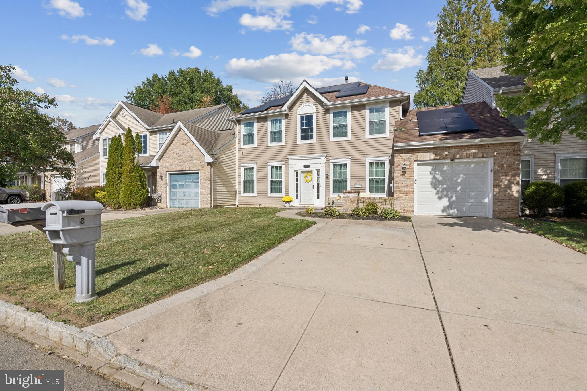 7 Meadowbrook Drive Westampton, NJ 08060 - Photo 2 of 25 a front view of a house with garden