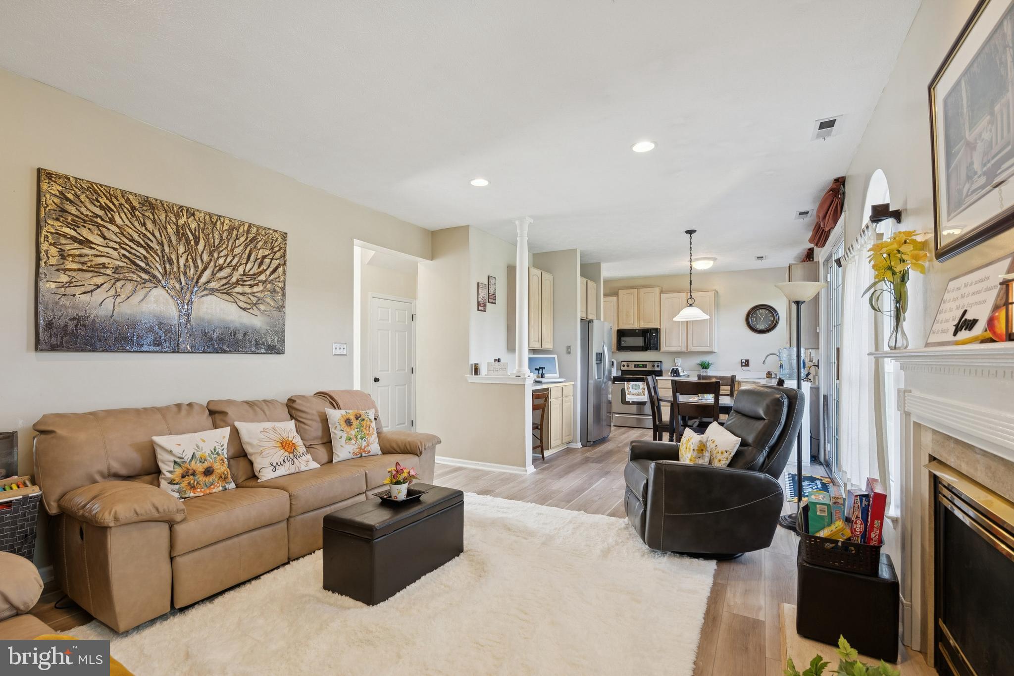 7 Meadowbrook Drive Westampton, NJ 08060 - Photo 8 of 25 a living room with furniture fireplace and a television