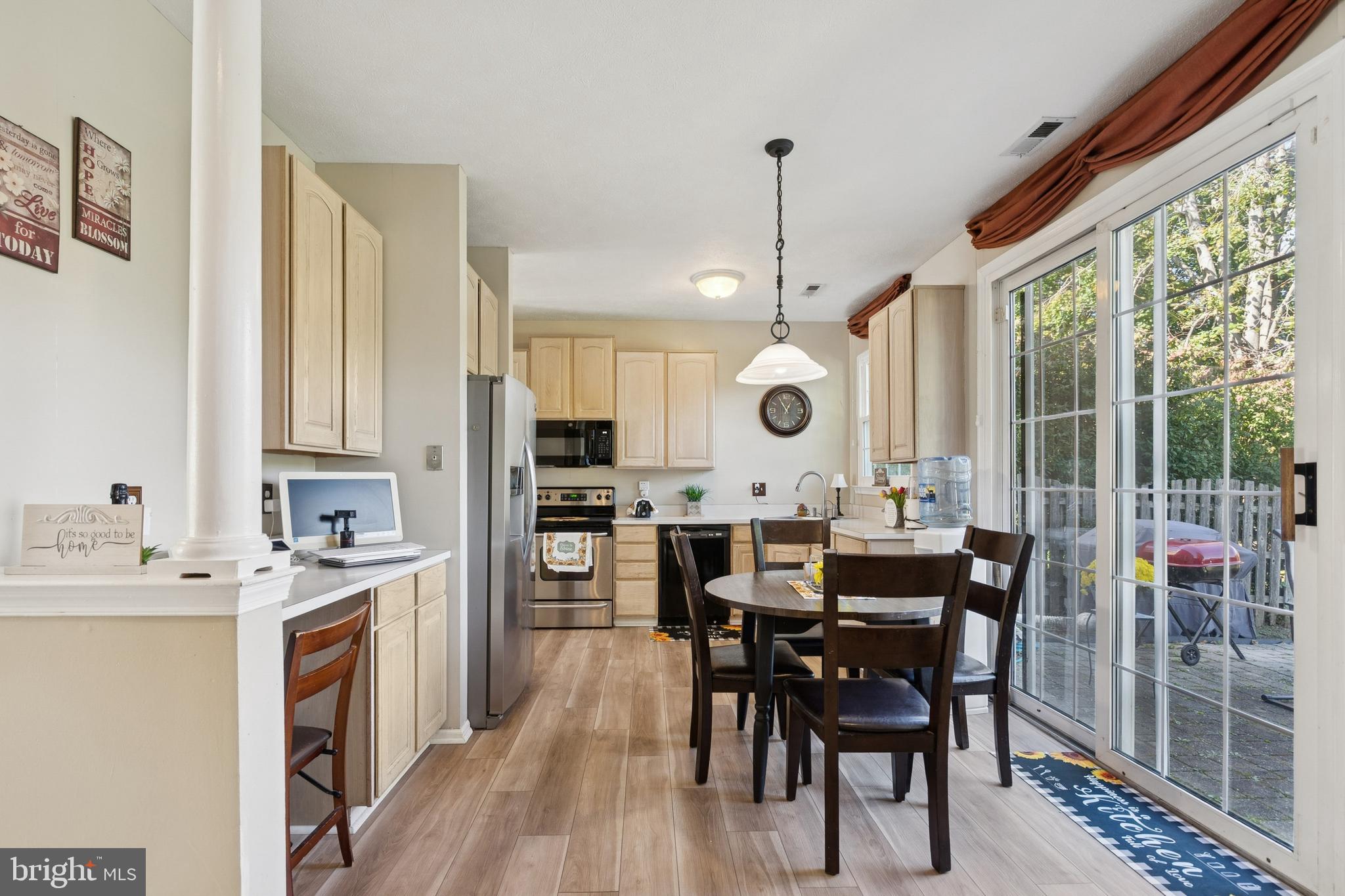 7 Meadowbrook Drive Westampton, NJ 08060 - Photo 9 of 25 a large kitchen with a table and chairs