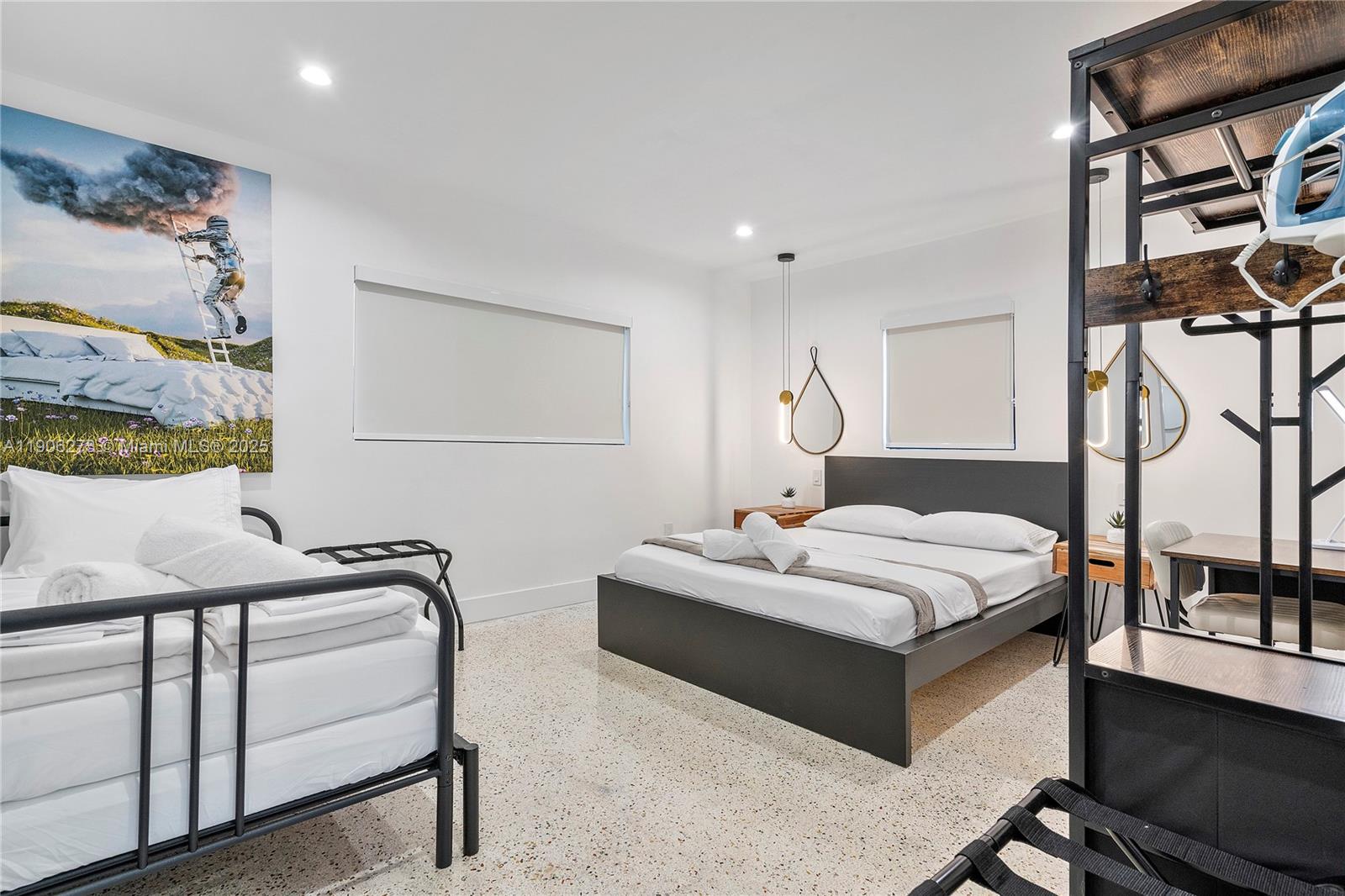 256 Northwest 57th Street Miami, FL 33127 - Photo 11 of 45 a bedroom with a bed and a dresser