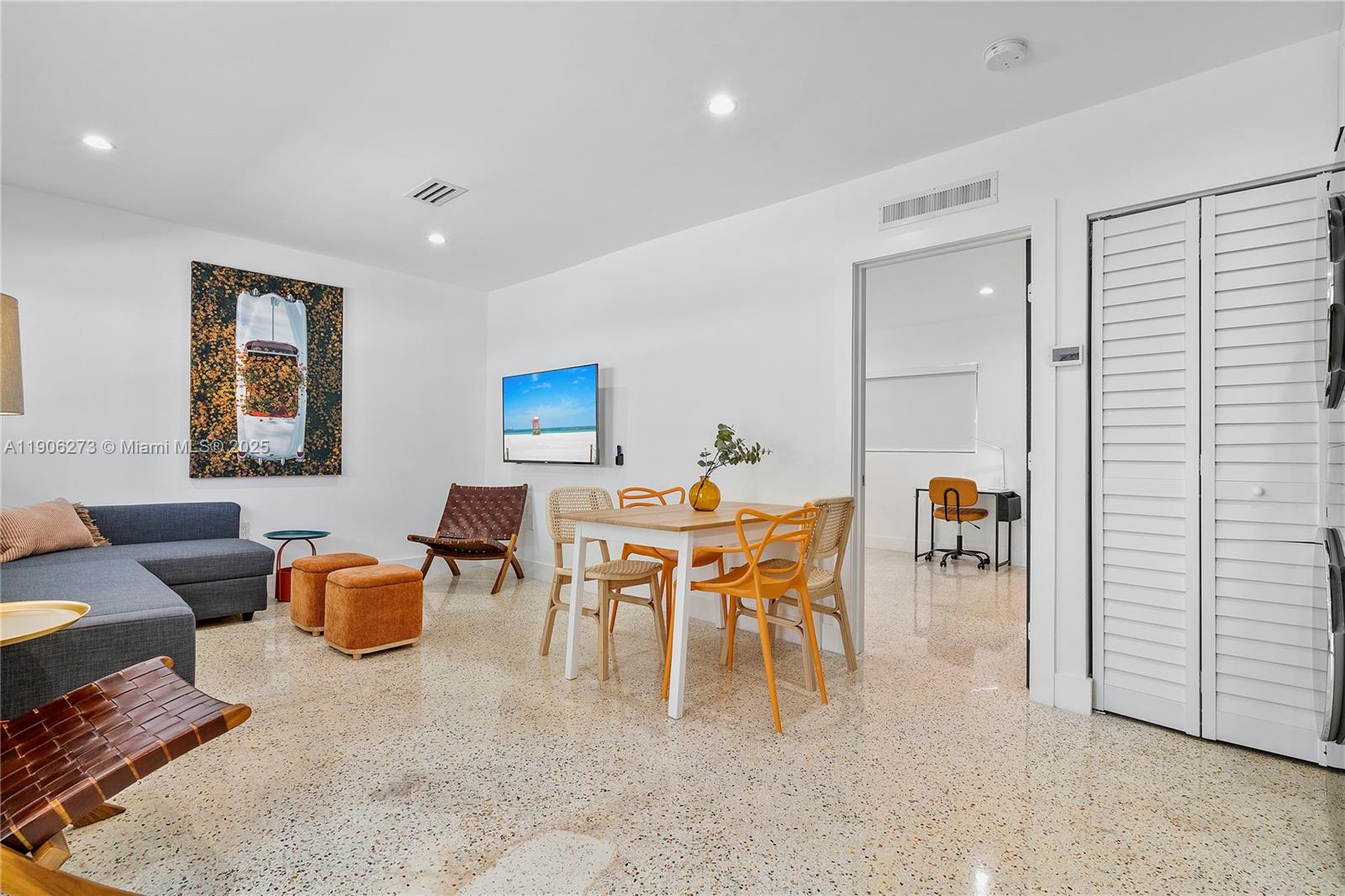 256 Northwest 57th Street Miami, FL 33127 - Photo 26 of 45 a dining room with furniture and a potted plant