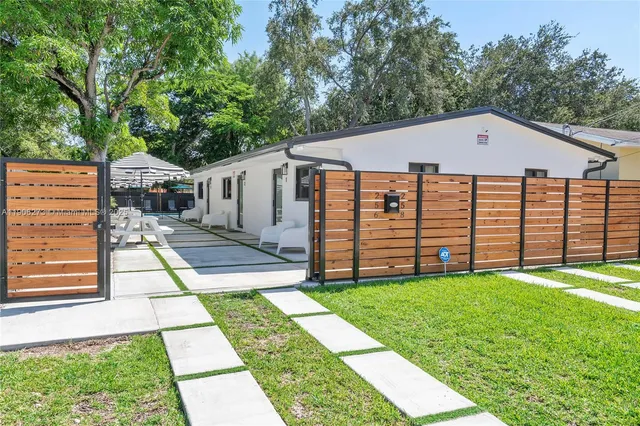 a view of a backyard with a garden