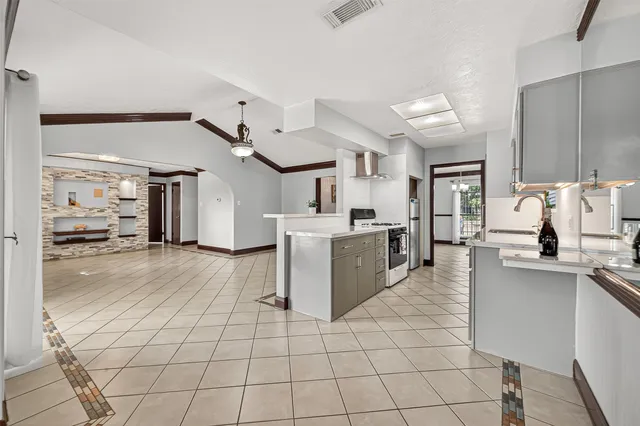 a bathroom with a sink a mirror and a bathtub