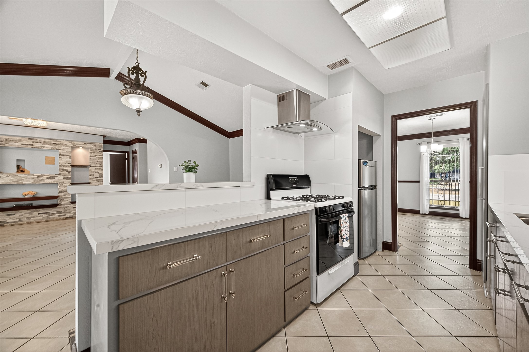 14007 Buffalo Speedway Houston, TX 77045 - Photo 23 of 46 a kitchen with stainless steel appliances granite countertop a sink and cabinets