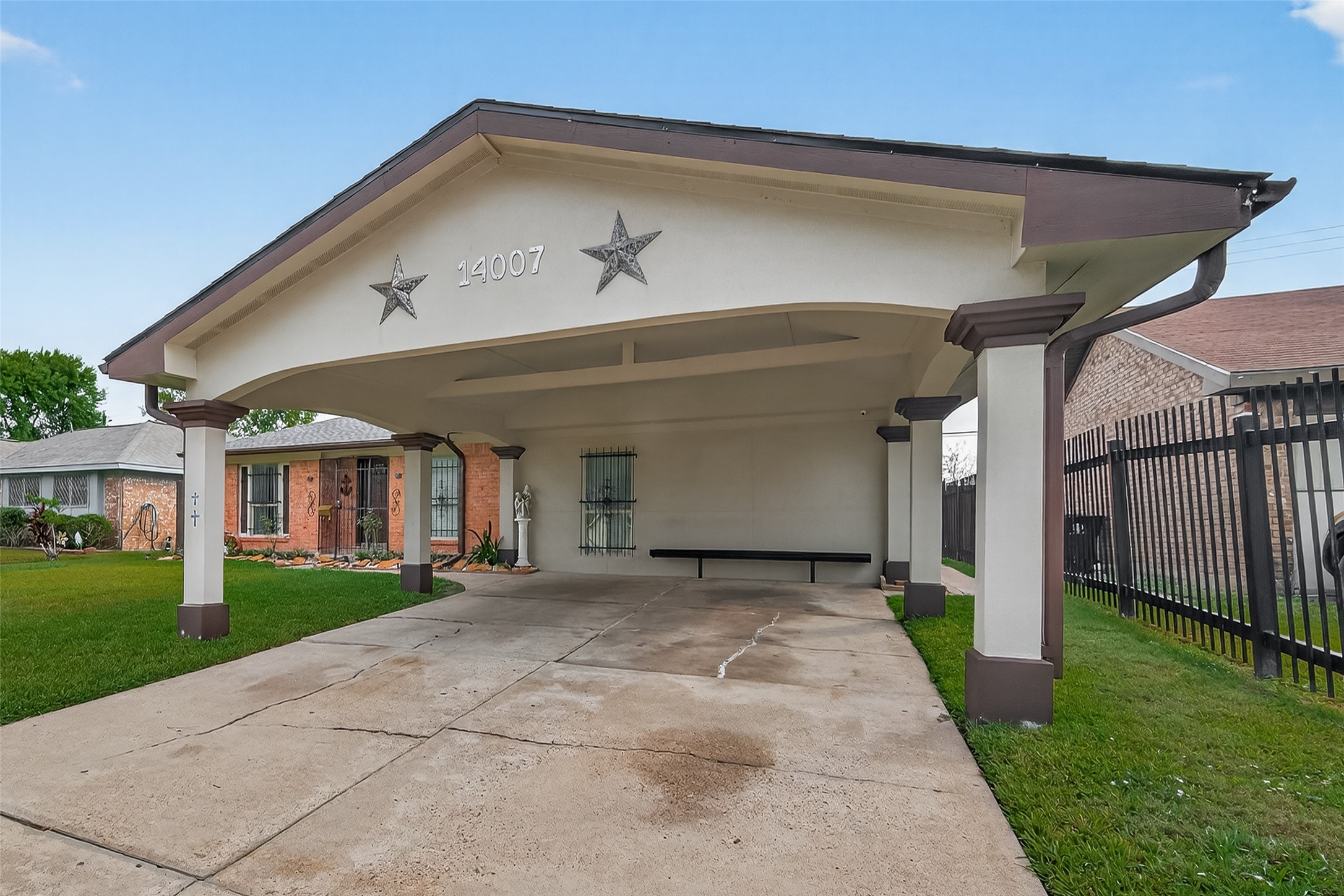 14007 Buffalo Speedway Houston, TX 77045 - Photo 4 of 46 a view of a house with a yard