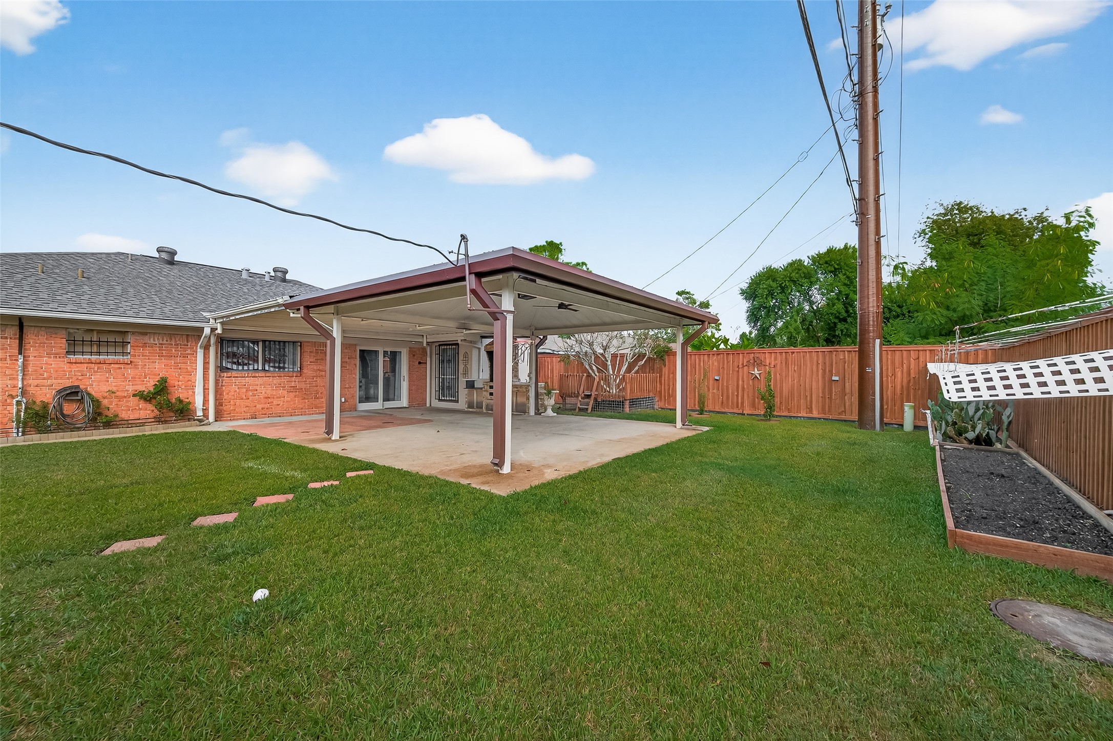 14007 Buffalo Speedway Houston, TX 77045 - Photo 44 of 46 a view of a house with a yard